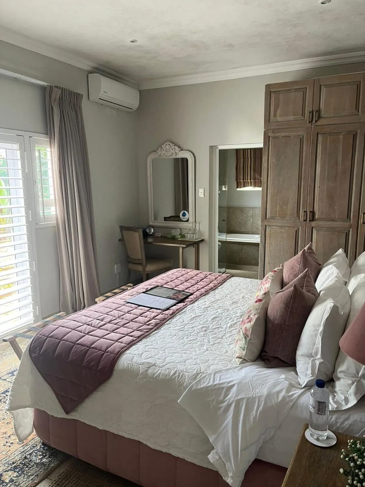 Bed in Sandals Guest House