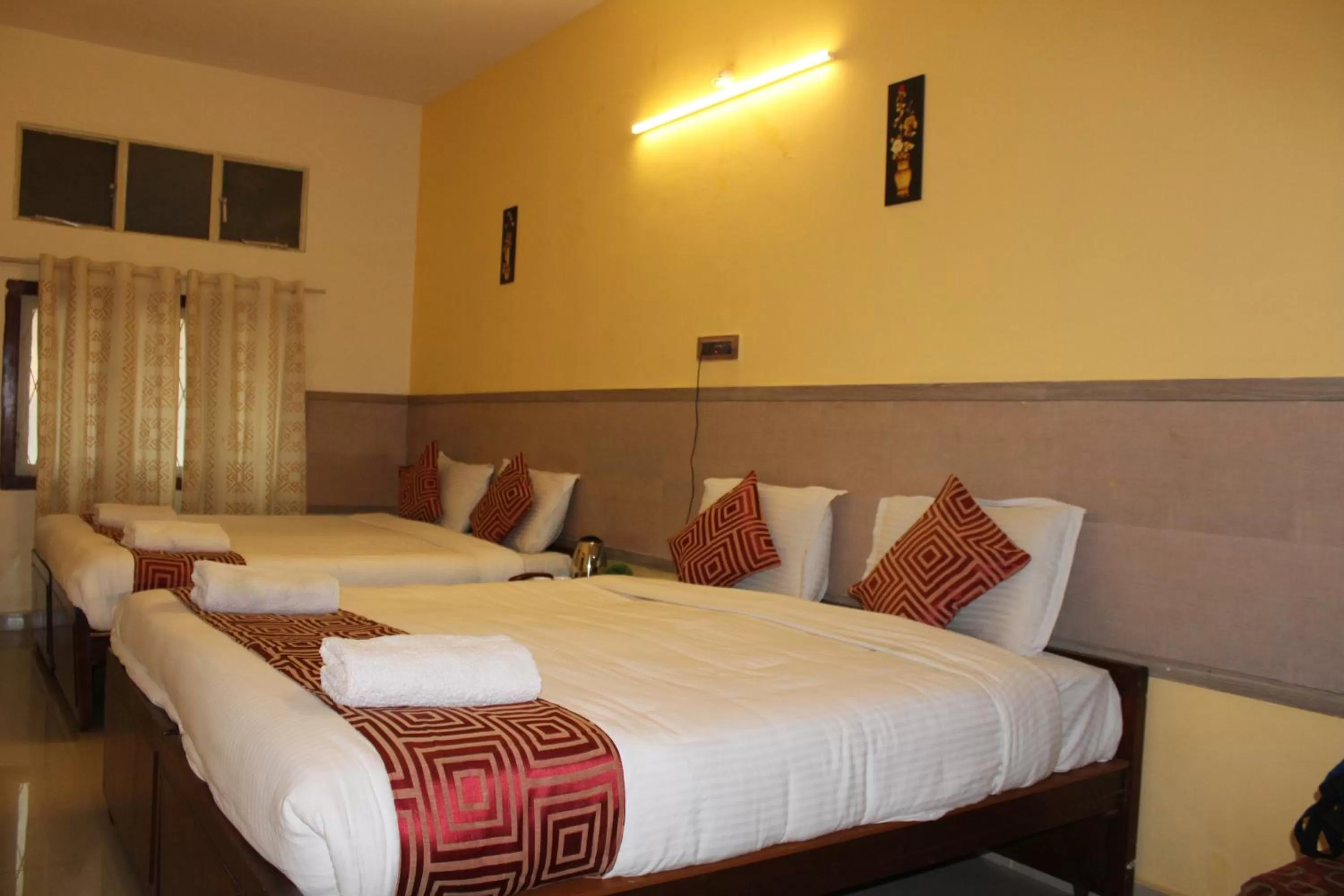 Bed in Hotel Kaveri