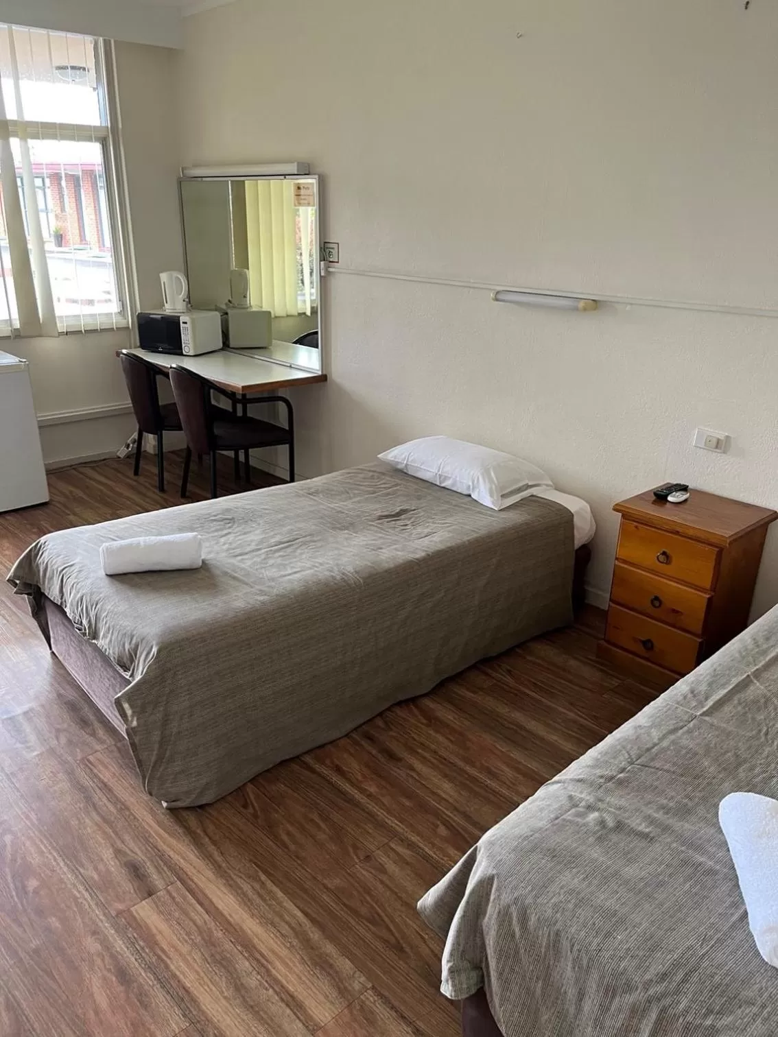 Bed in Crown Hotel Motel