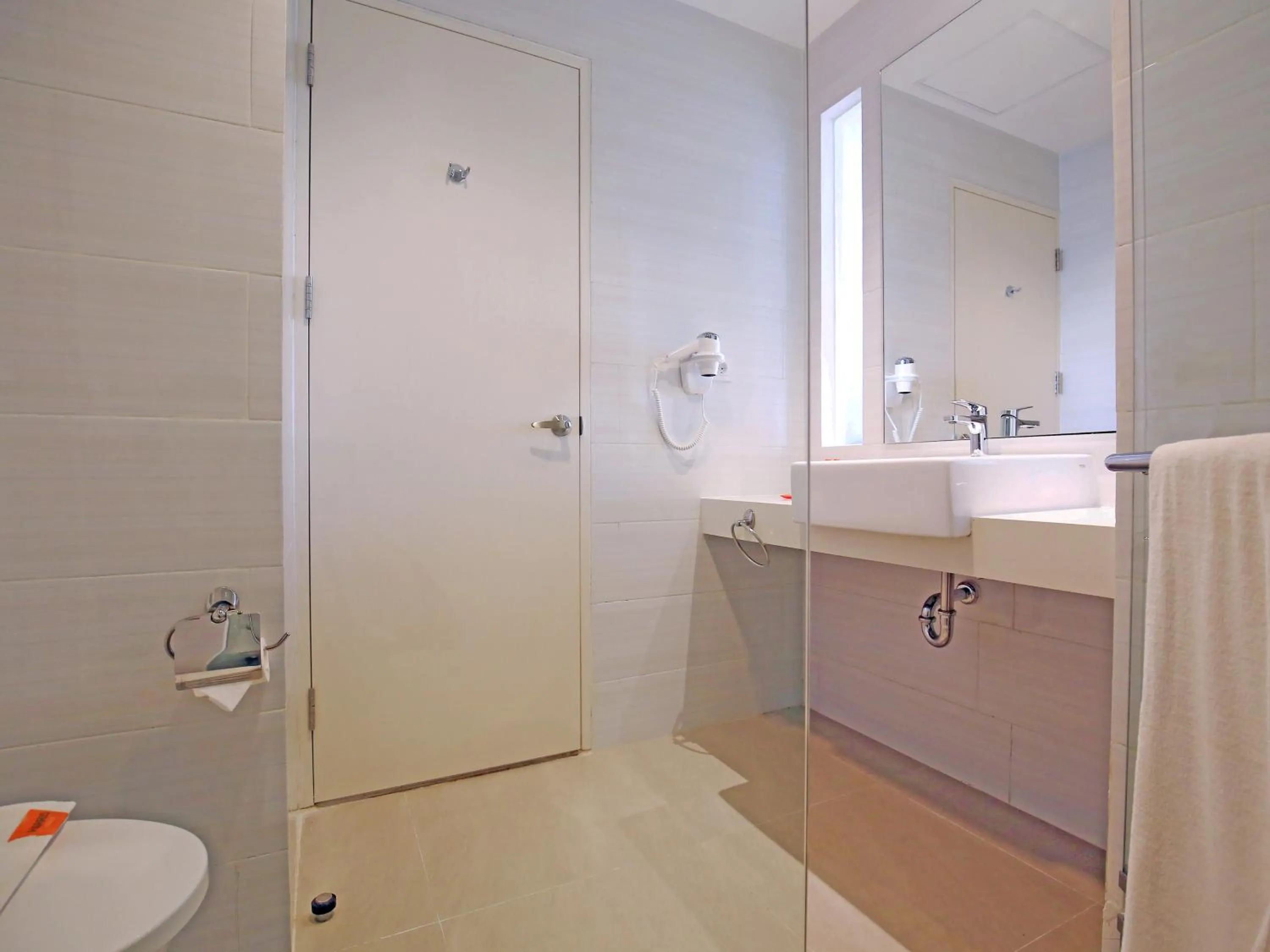 Bathroom in HARRIS Hotel Samarinda