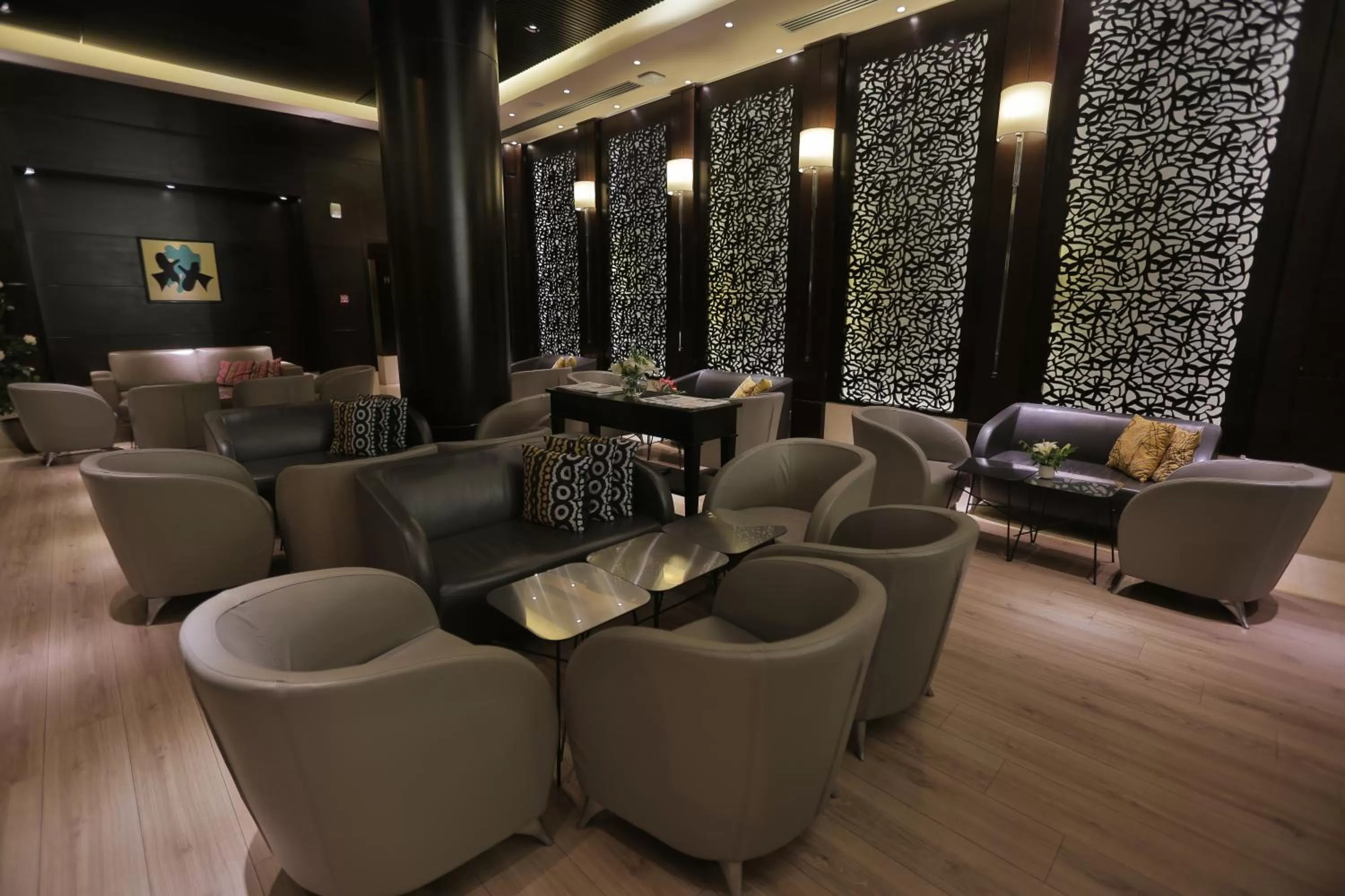 Communal lounge/ TV room in Le Corail Suites Hotel