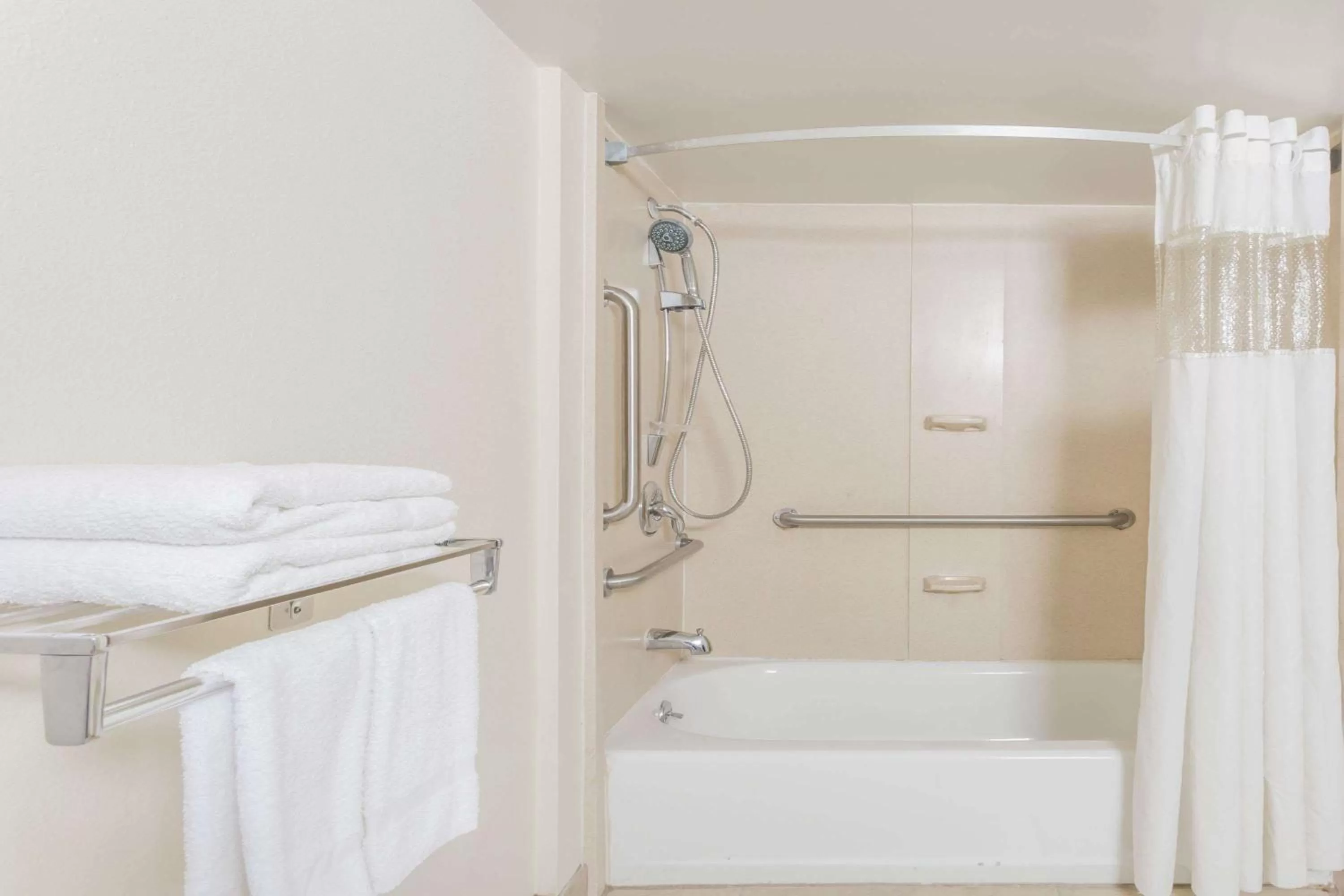 Bathroom in Days Inn by Wyndham Camp Springs Andrews AFB