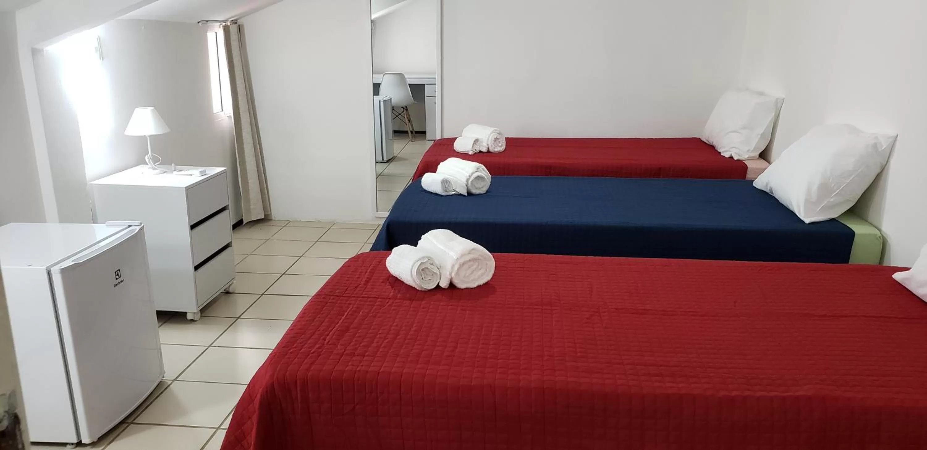 Bed in LIVE IN FORTALEZA HOTEL