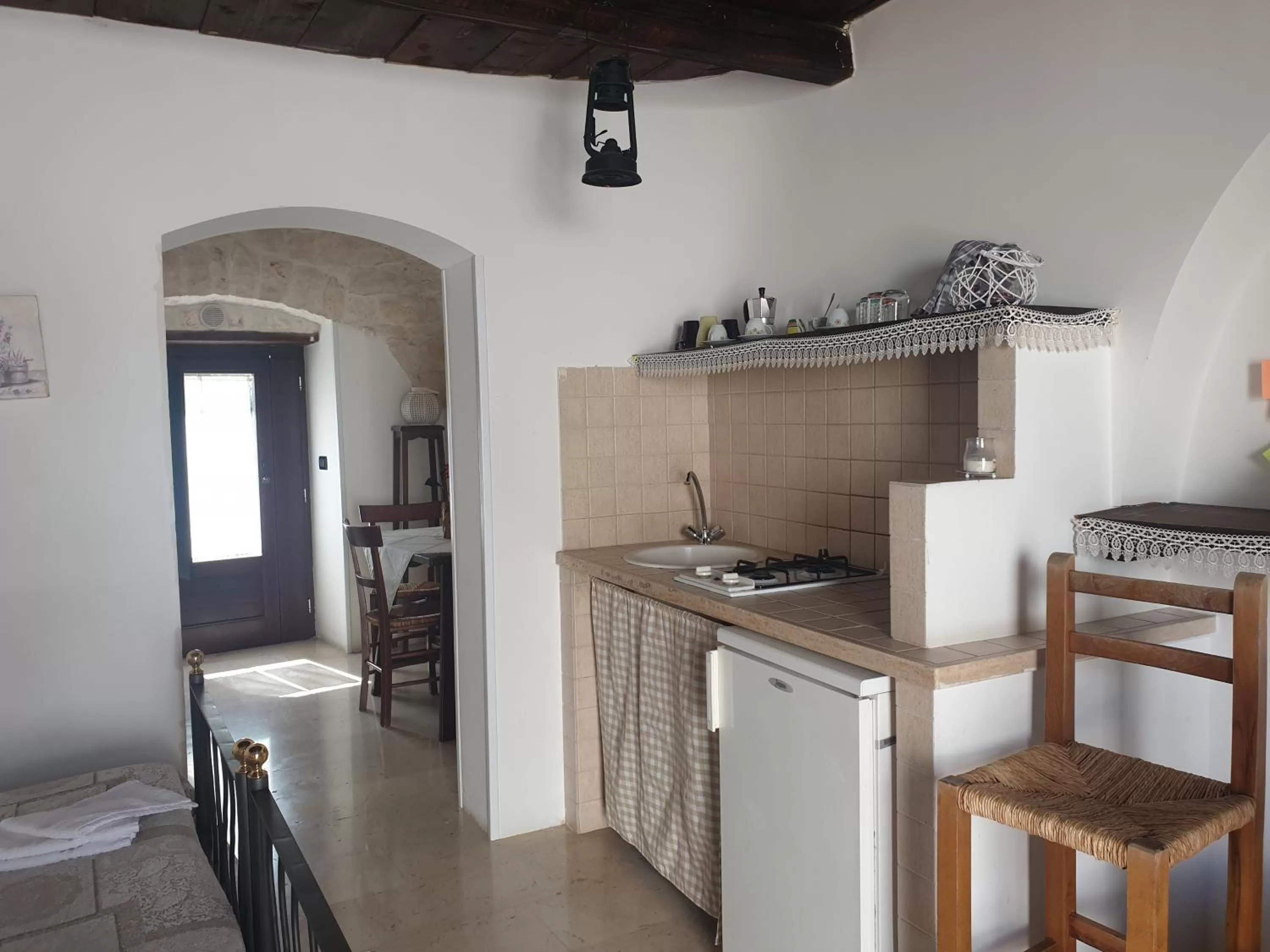 Kitchen or kitchenette in Giardino Dei Trulli