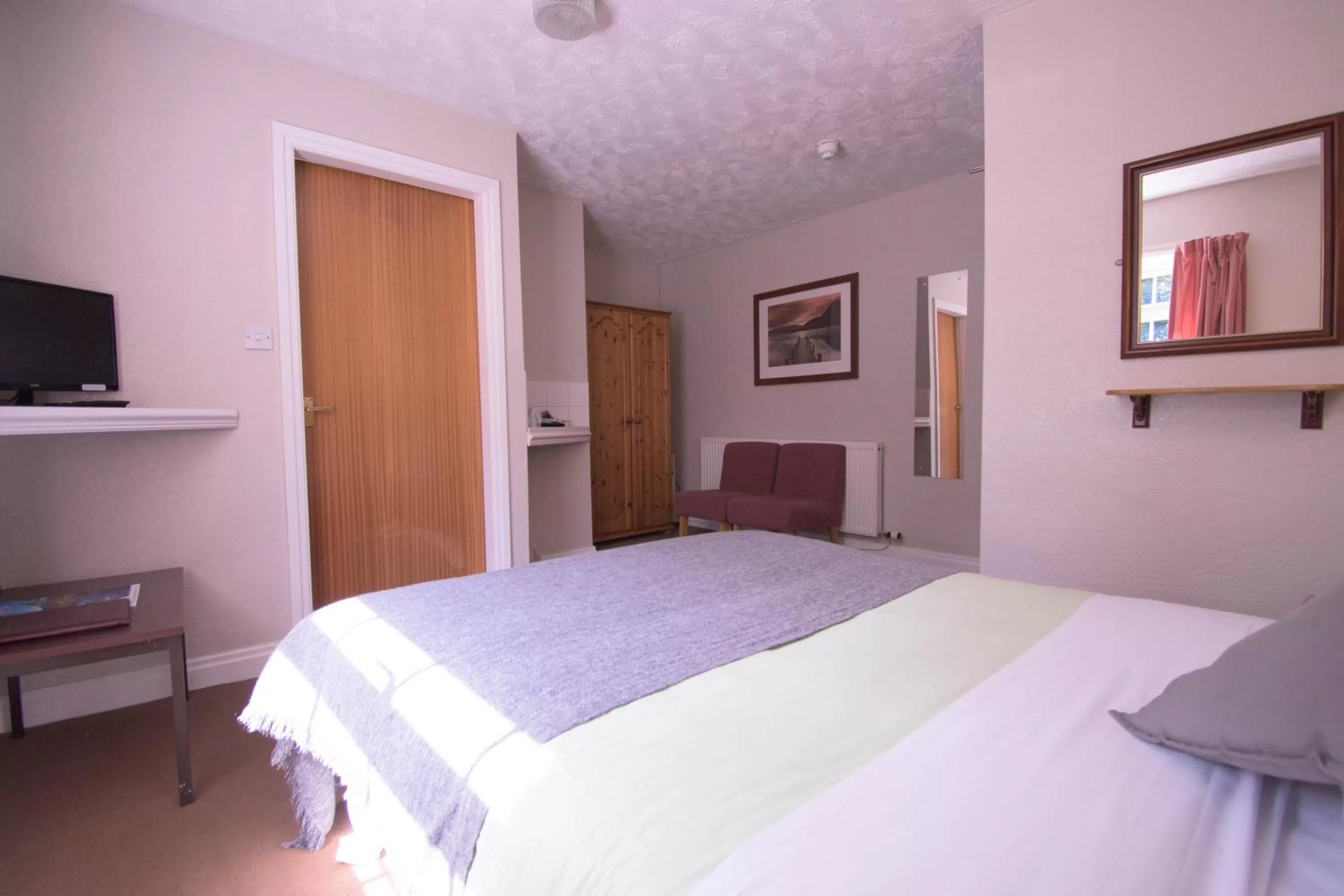 Bed in Pinegrove Hotel