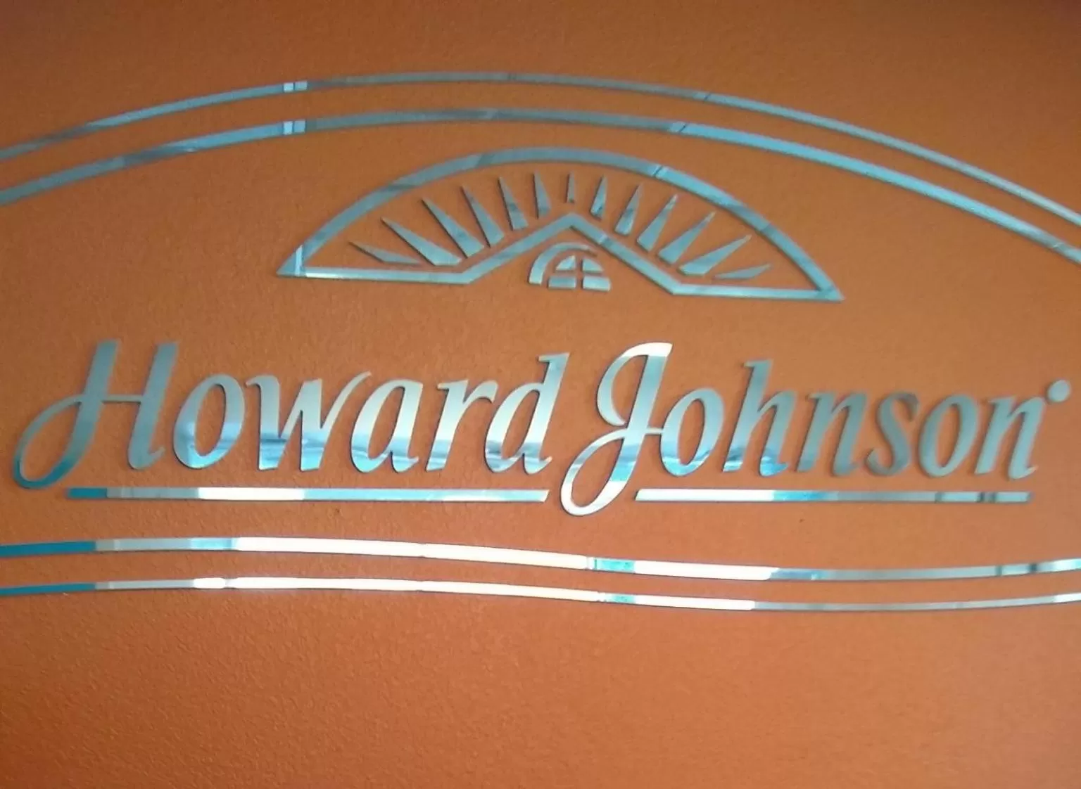 Property logo or sign in Howard Johnson by Wyndham Virginia Beach