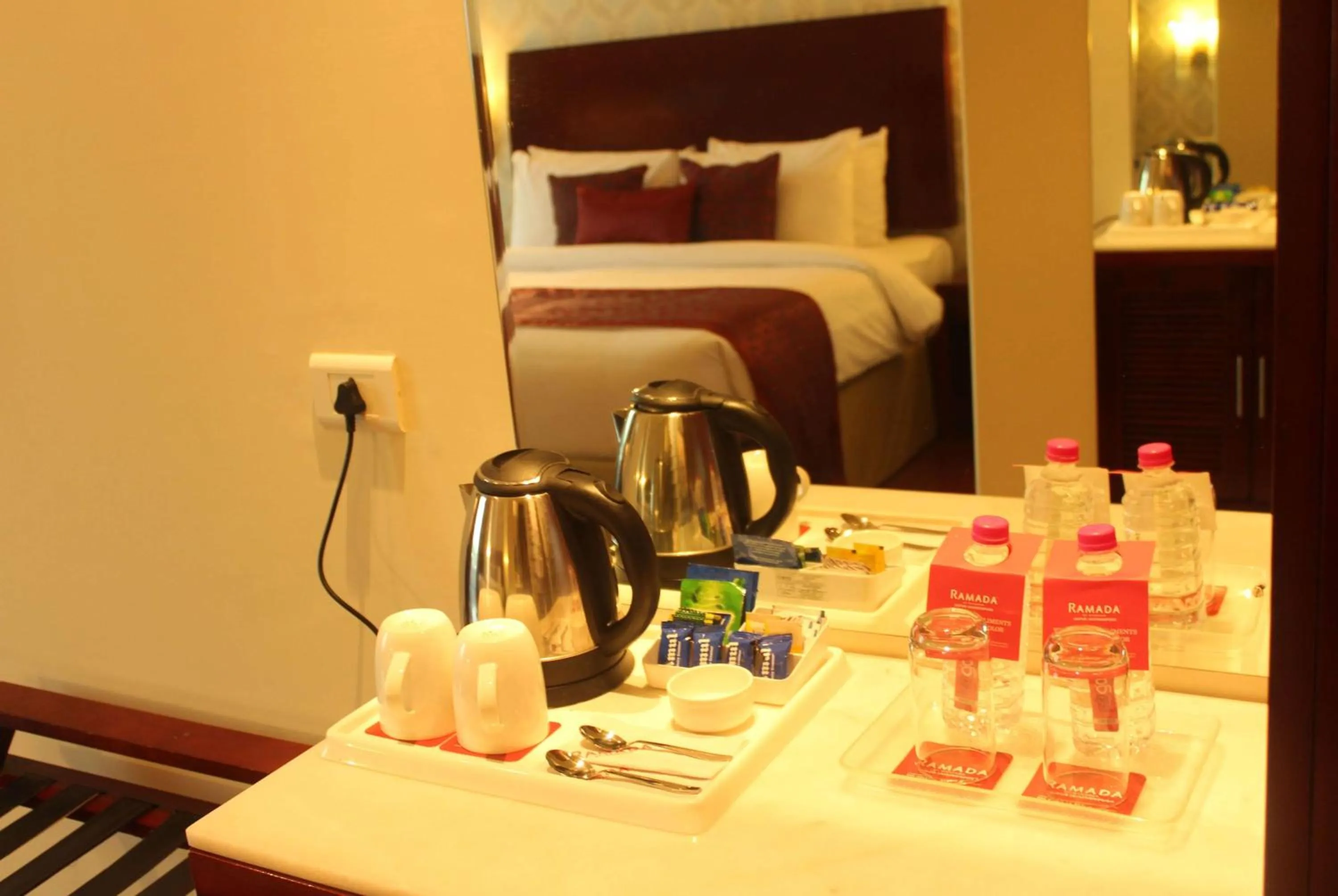 Photo of the whole room, Bed in Ramada by Wyndham Jaipur Jaisinghpura