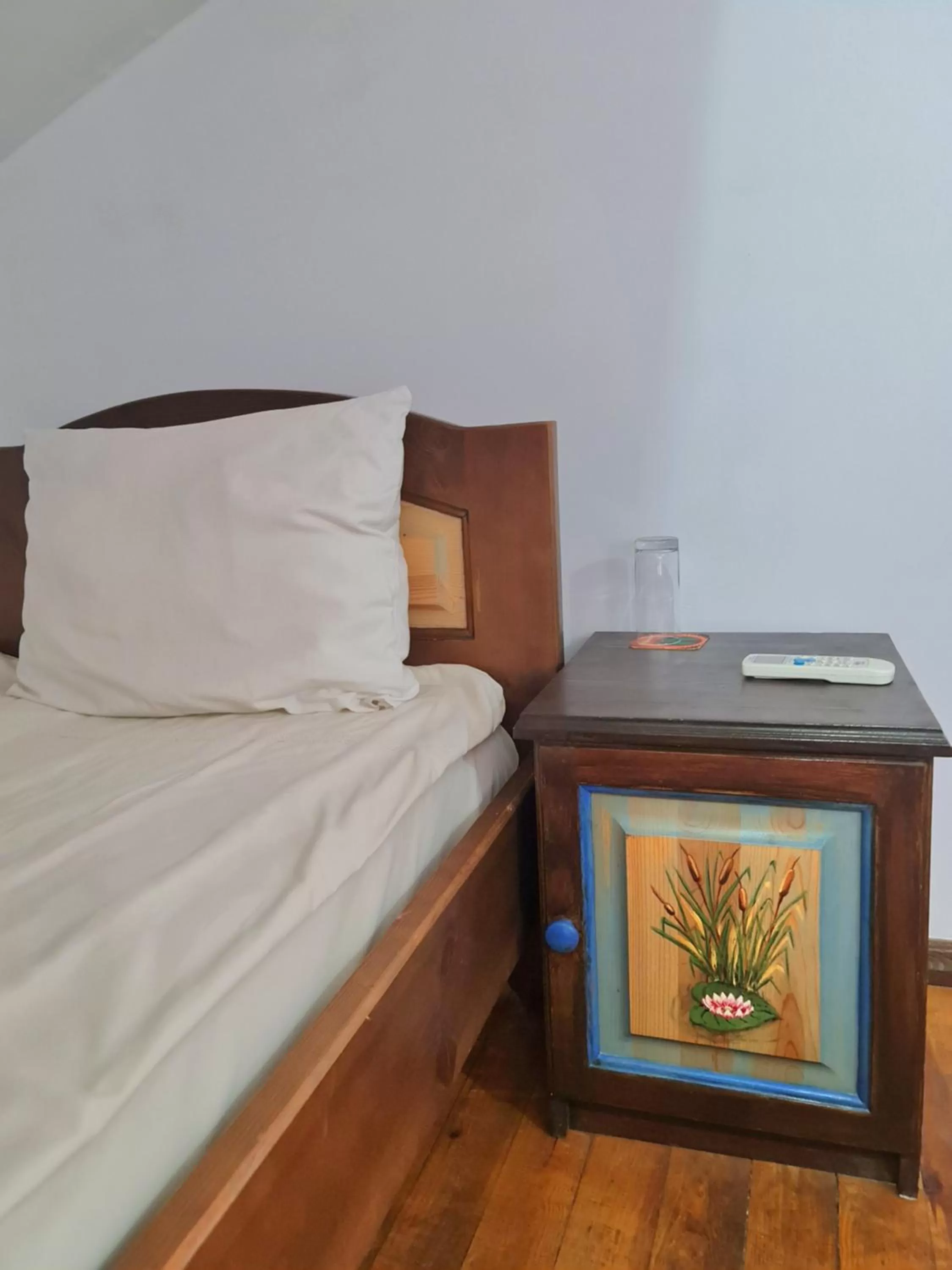 Bed in The Old House Family Hotel