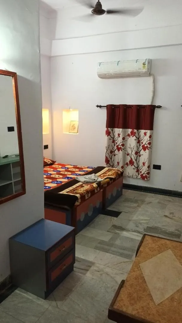 Bedroom, Bed in Jag Niwas Guest House & pure veg restaurant