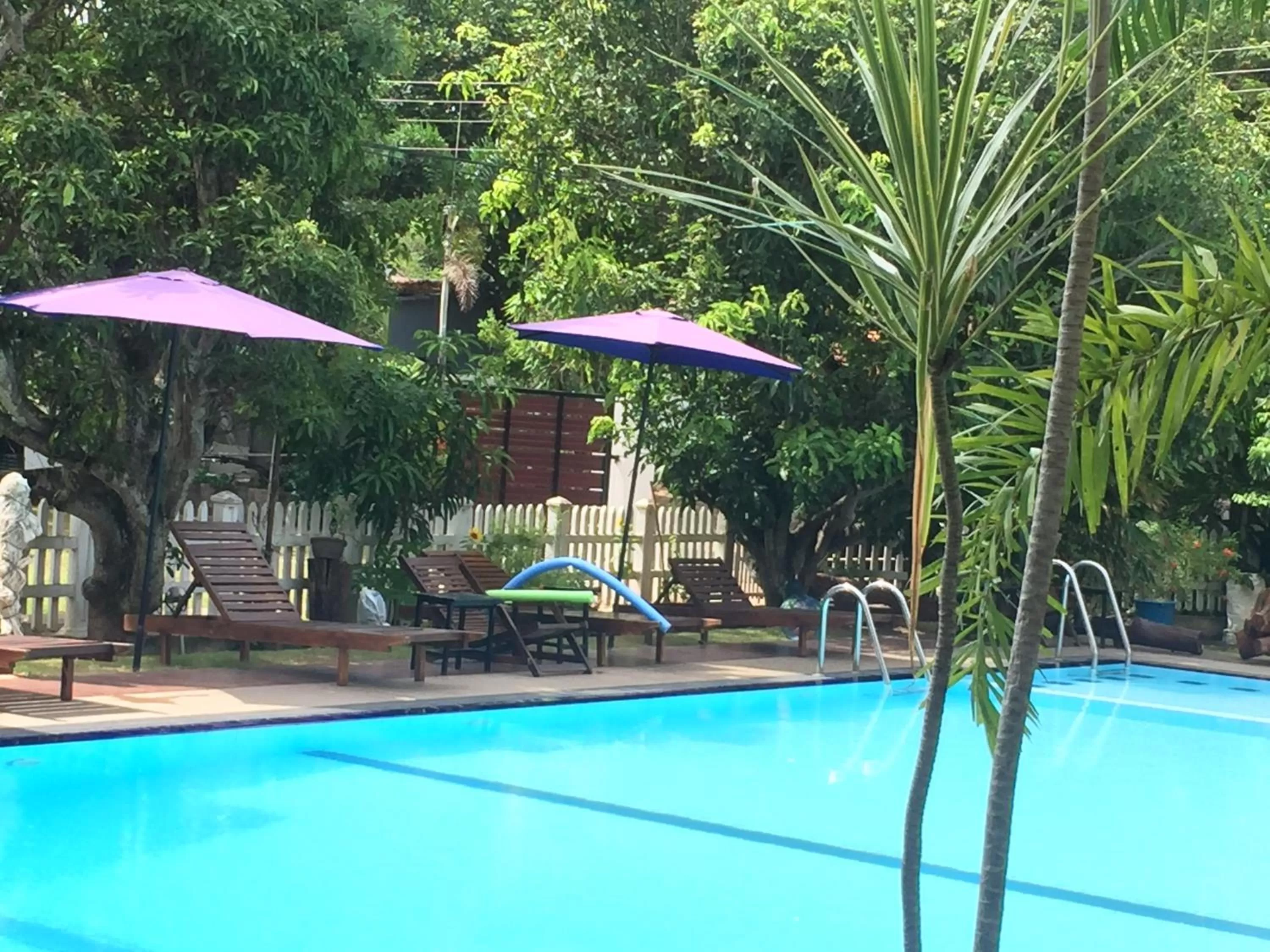 Swimming Pool in WindMill Beach Villa and Hotel