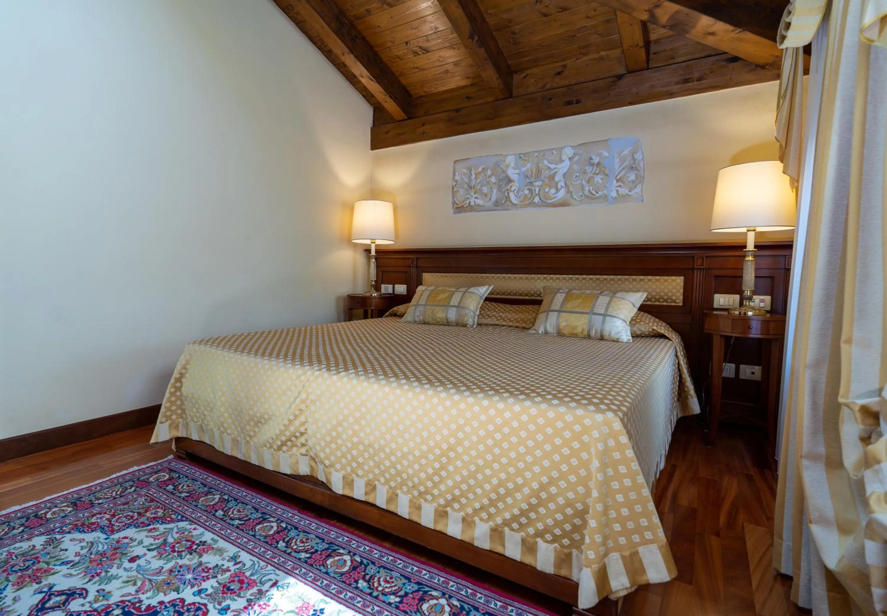 Bed in Le Muse Hotel