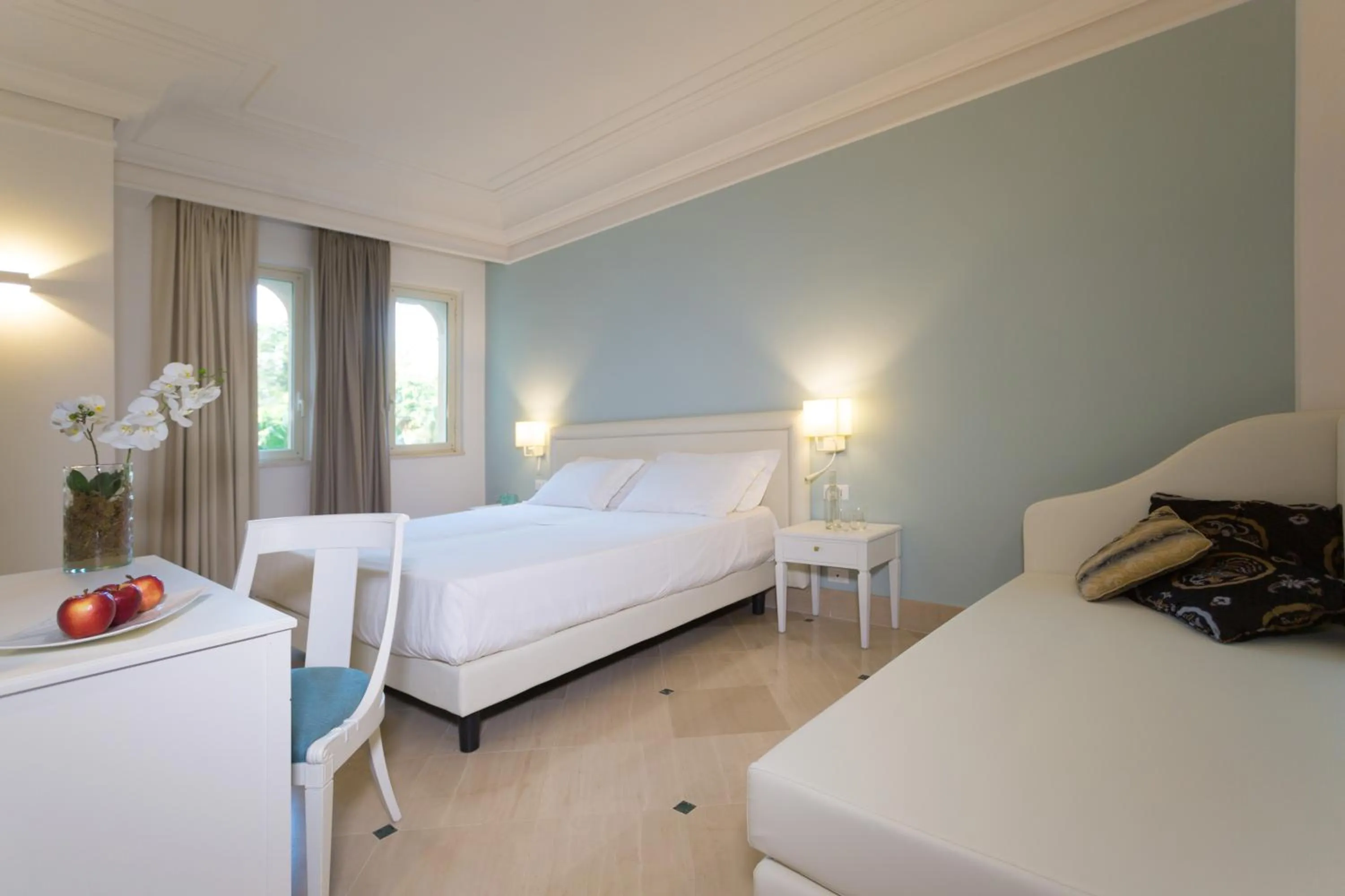 Bed in Hellenia Yachting Hotel & SPA