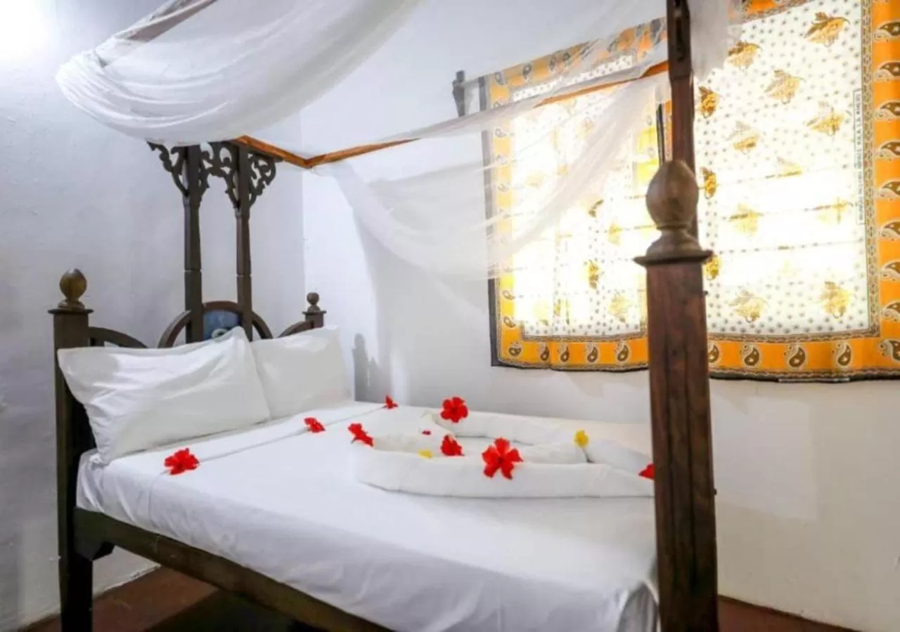 Photo of the whole room, Bed in Mobydick Bungalow Nungwi