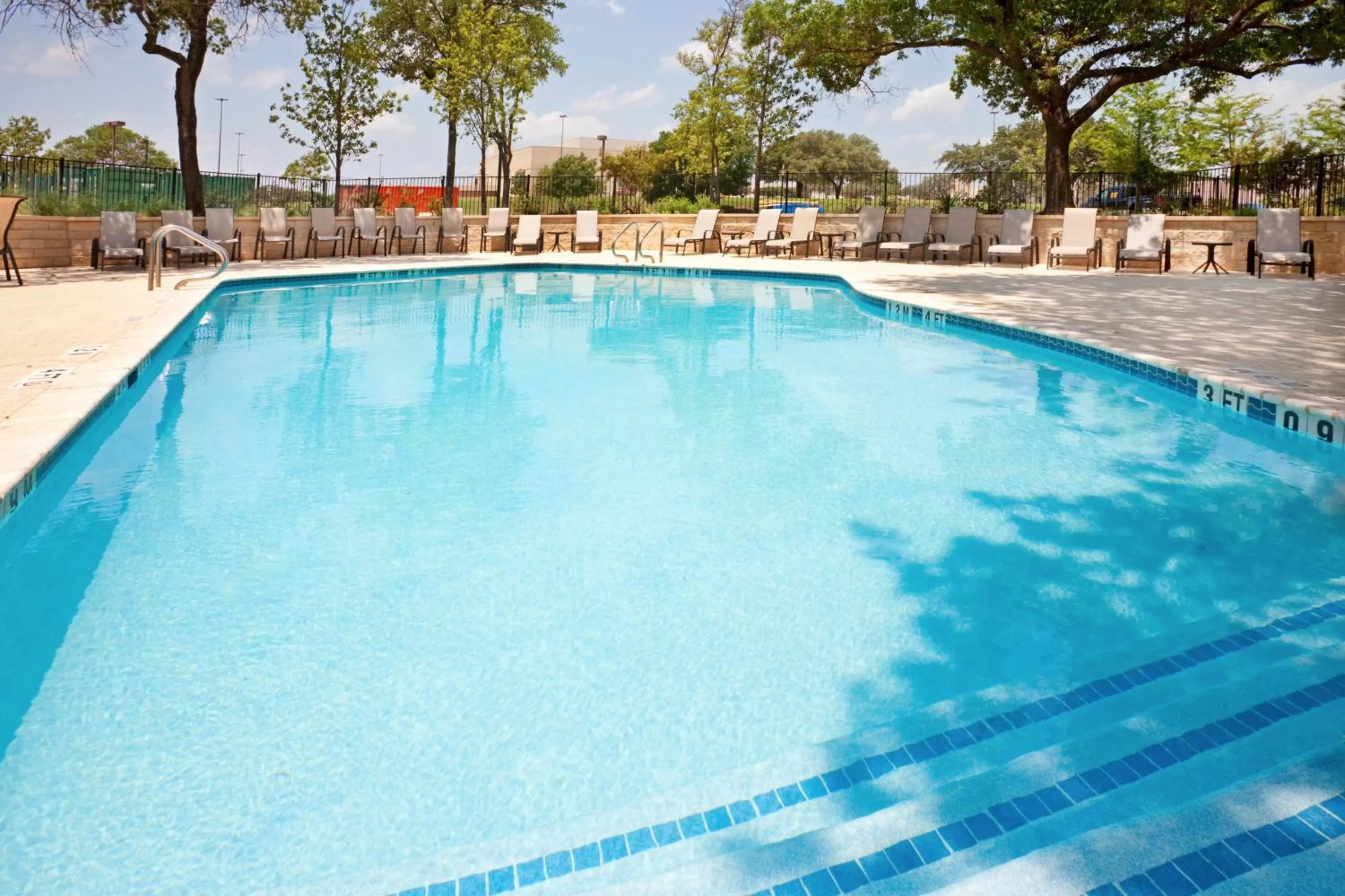 Swimming pool in Holiday Inn Austin Midtown by IHG