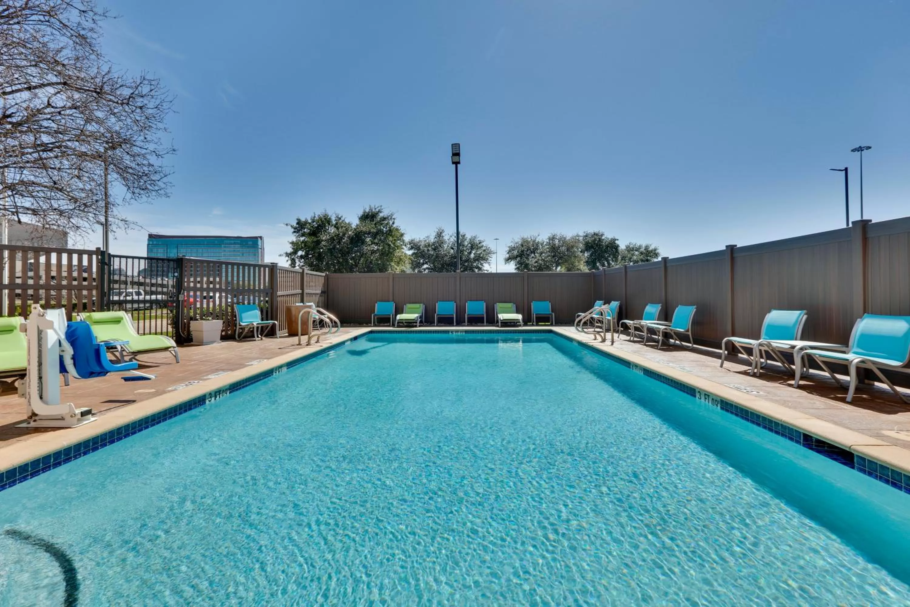 Swimming pool in Holiday Inn Express & Suites Irving Conv Ctr - Las Colinas by IHG