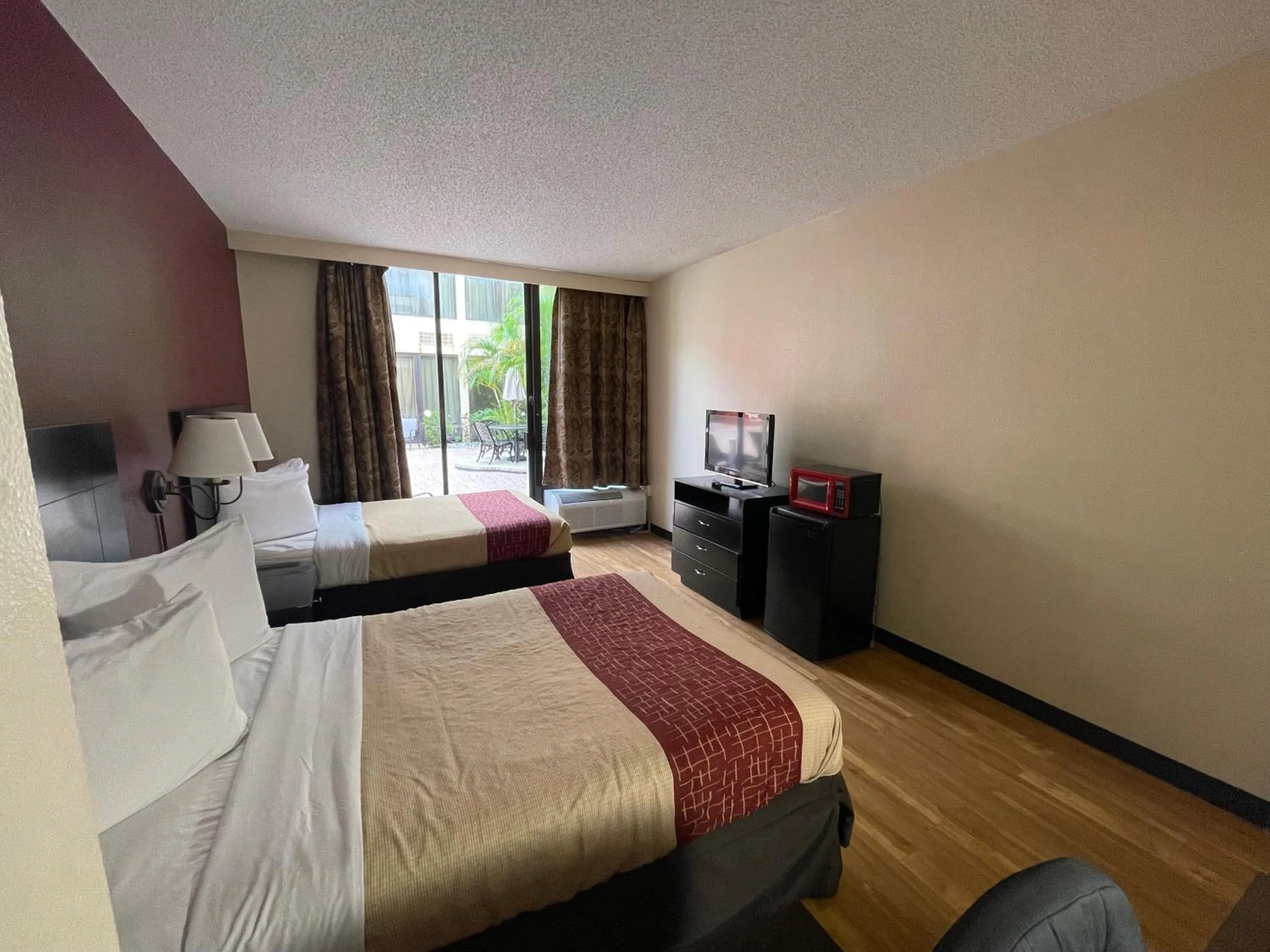 Photo of the whole room in Tropical Palms Hotel