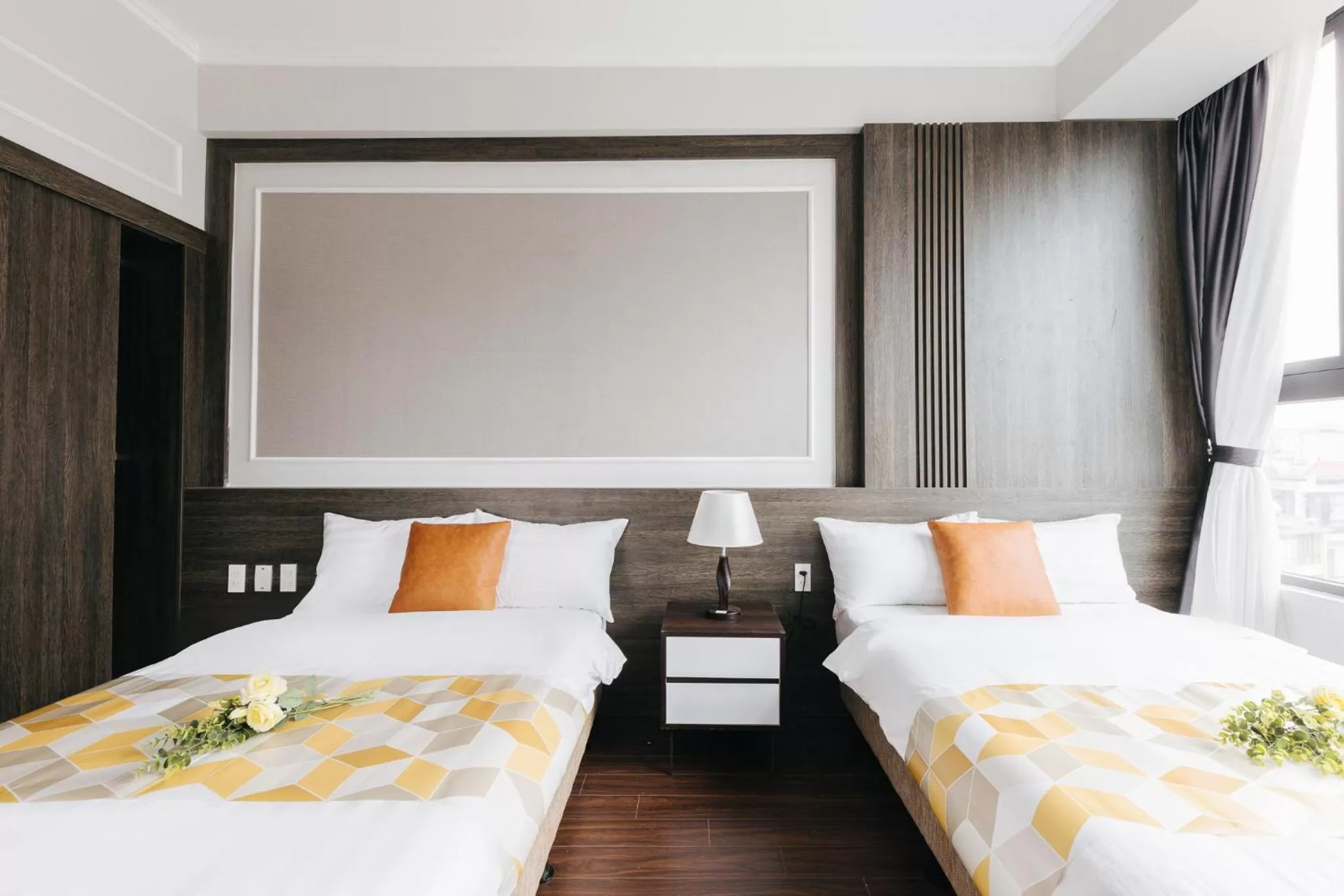 Bed in Ivy Hotel & Apartment