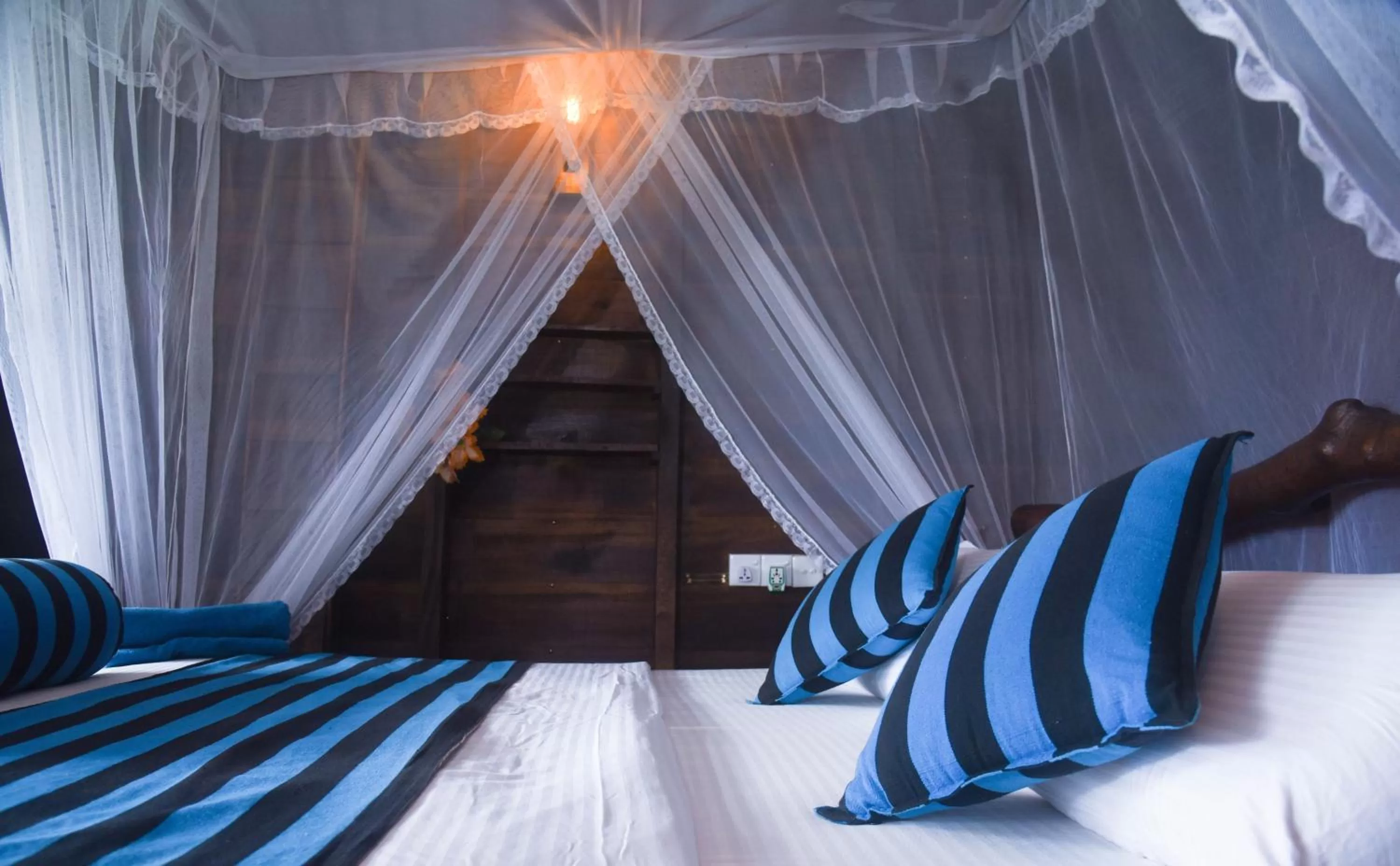 Bed in Madushanka Resort