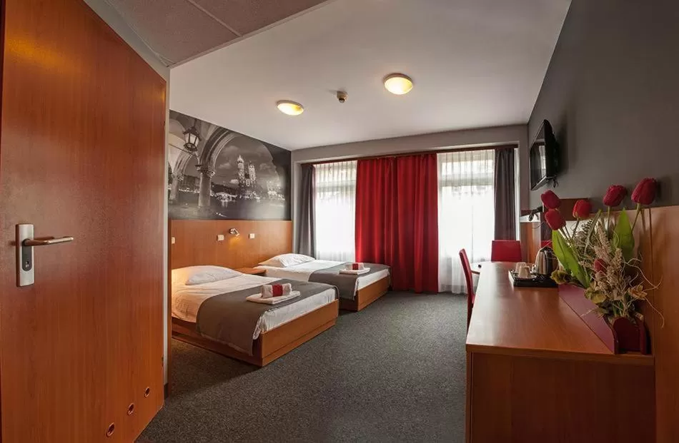 Bed in Hotel Alexander