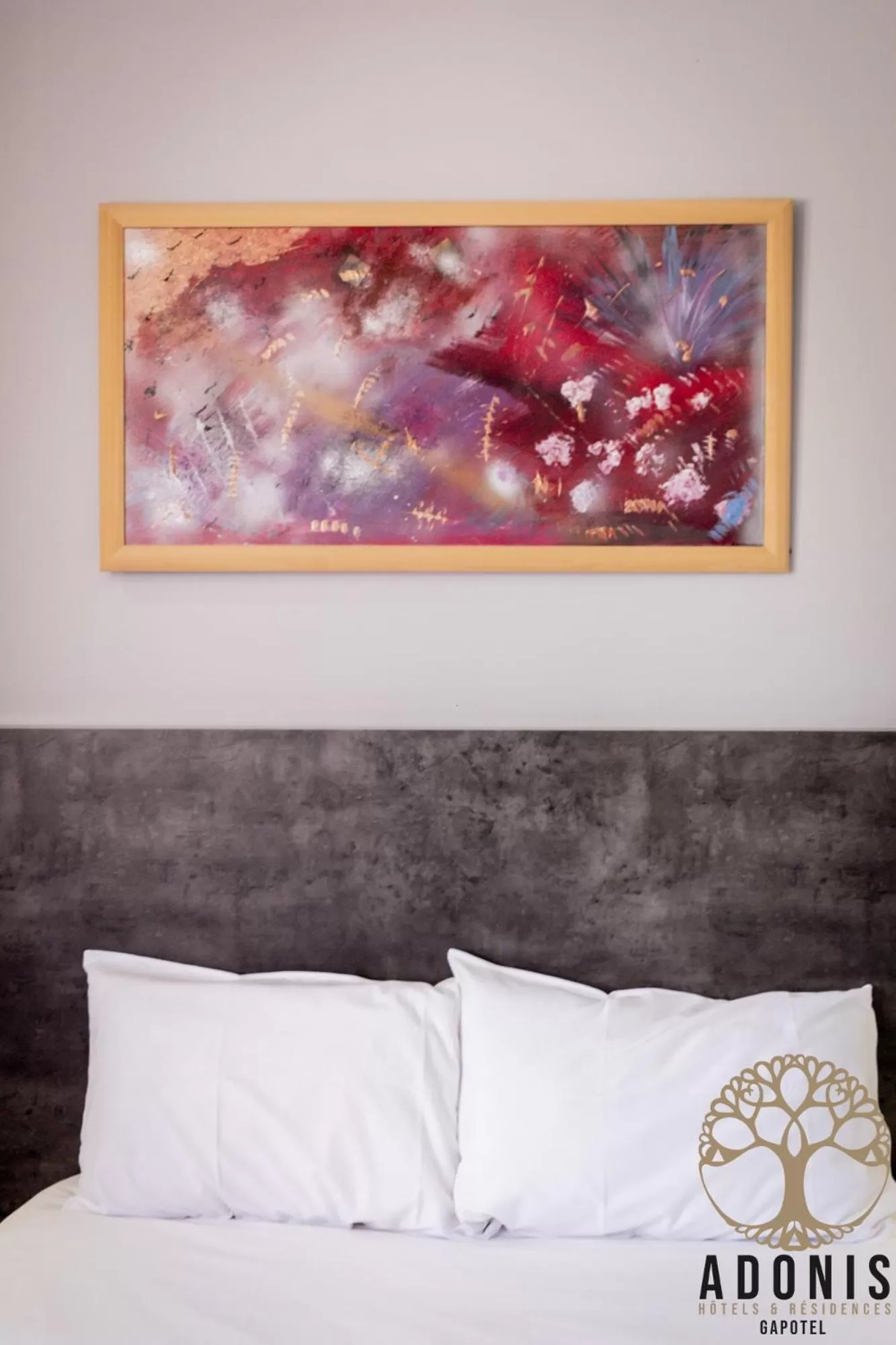 Bed in Adonis Gapotel