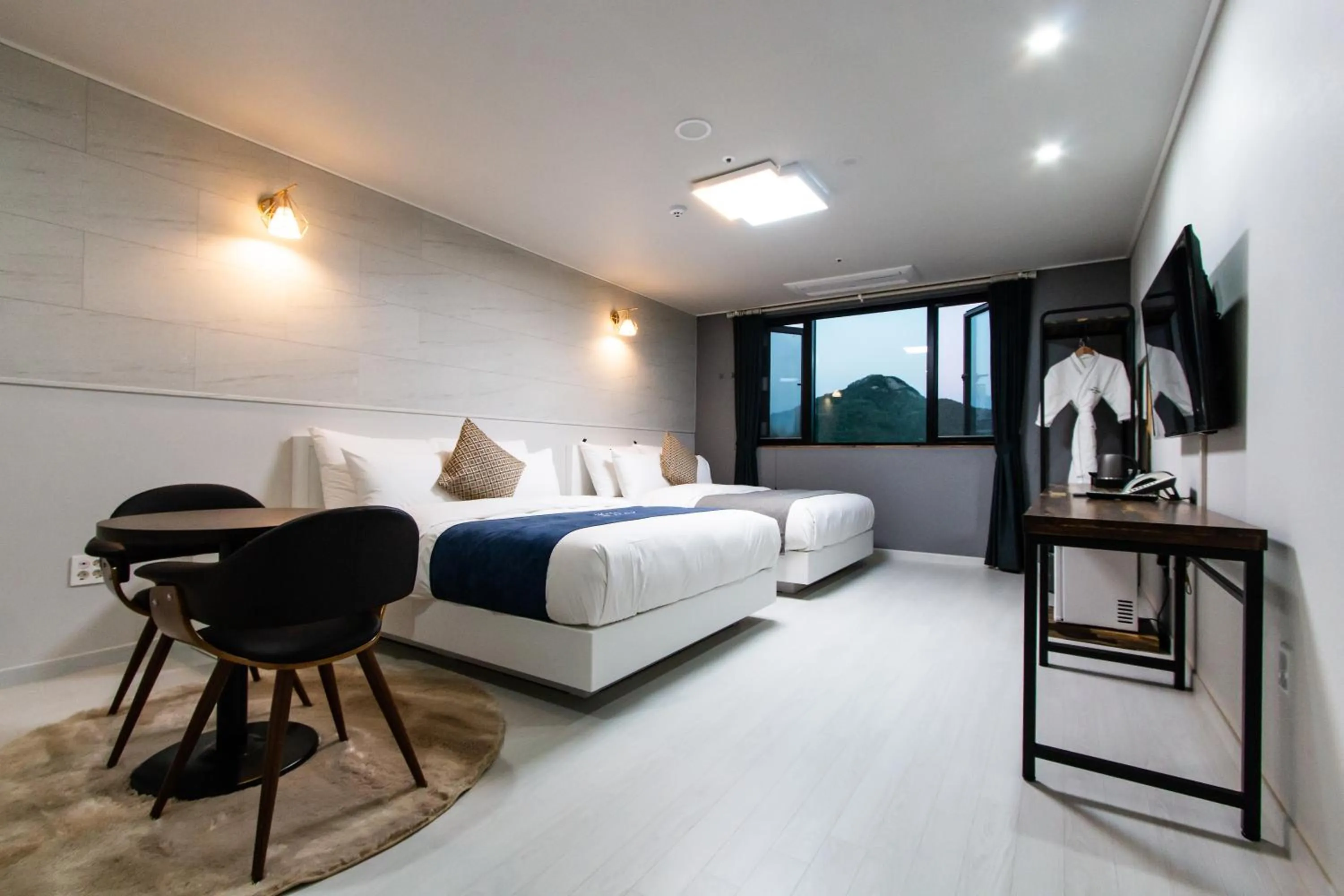 Bed in CM Park Hotel