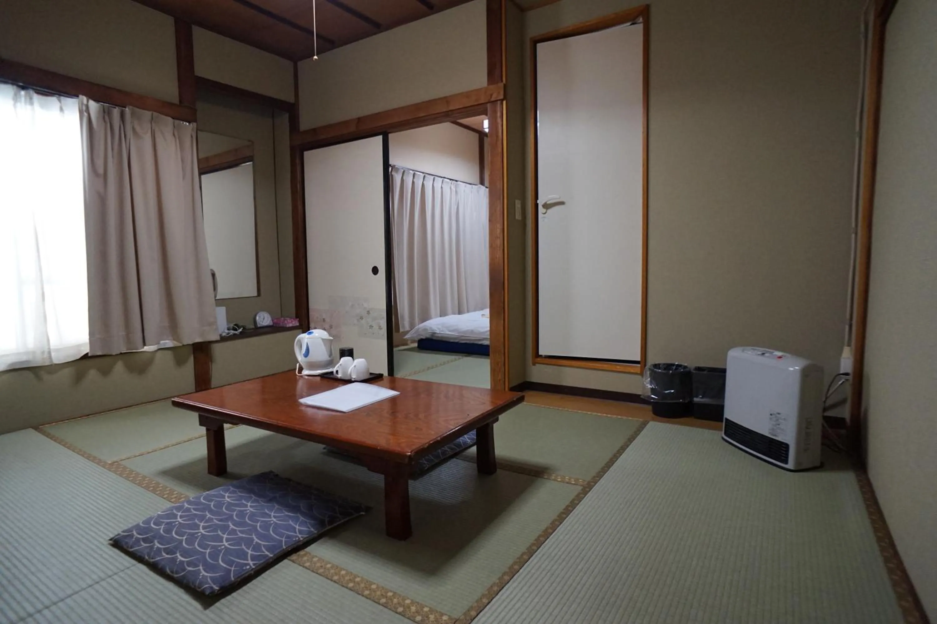Photo of the whole room, Bed in Ryokan Katsutaro