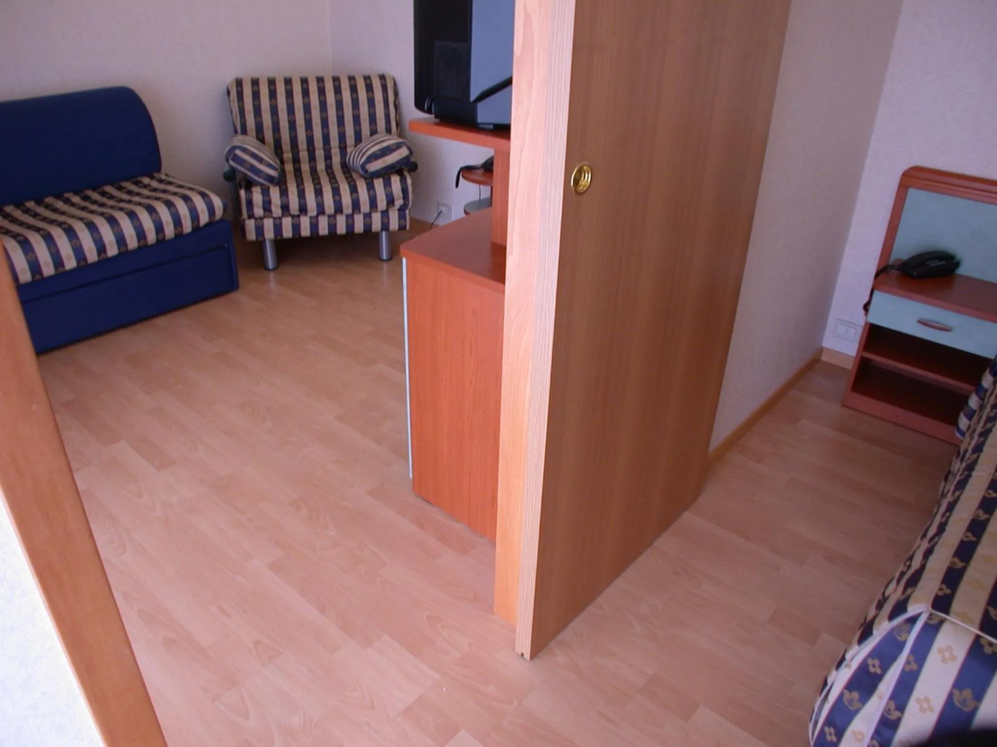 Bedroom in Hotel La Pergola