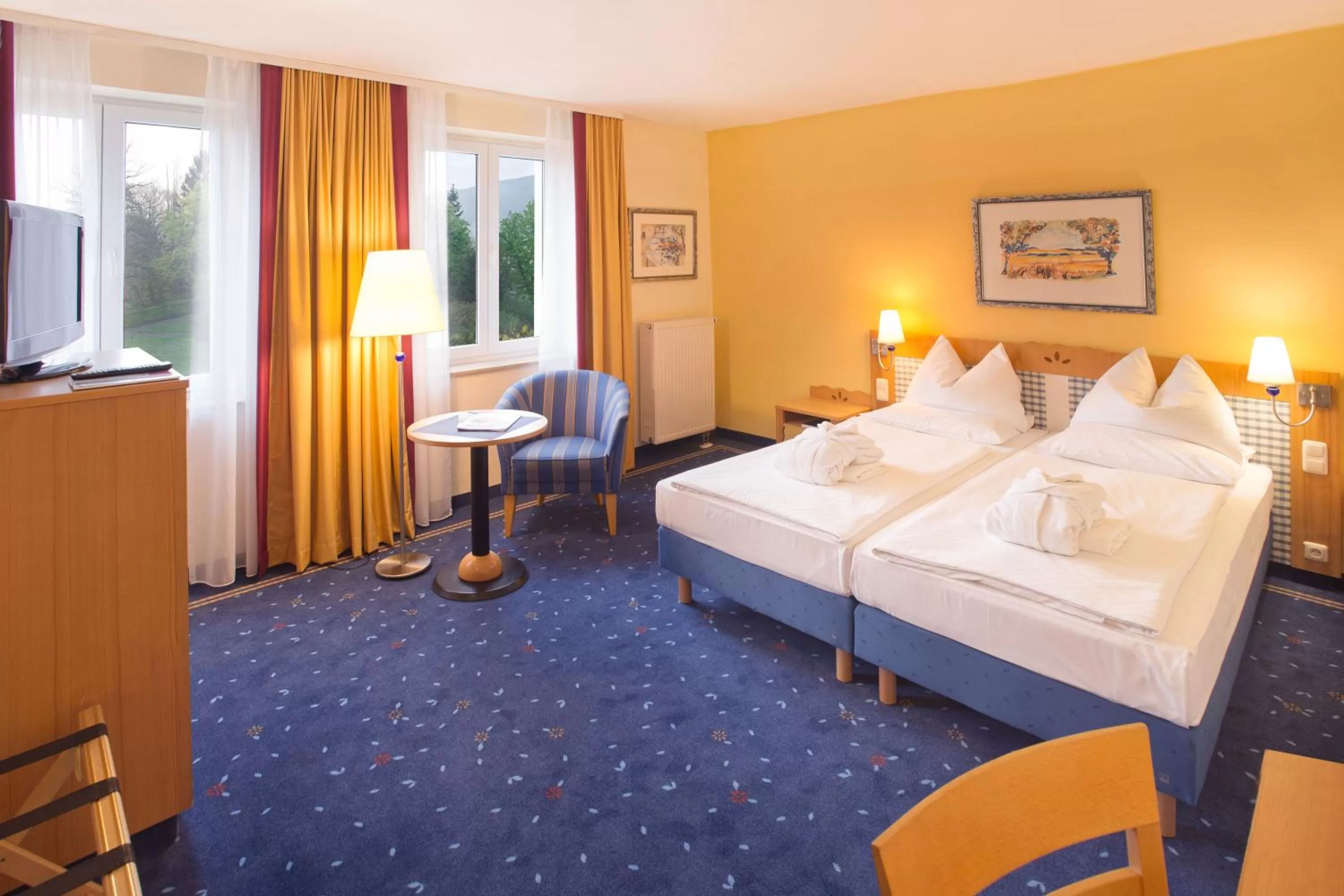 Bedroom, Bed in H+ Hotel & SPA Friedrichroda