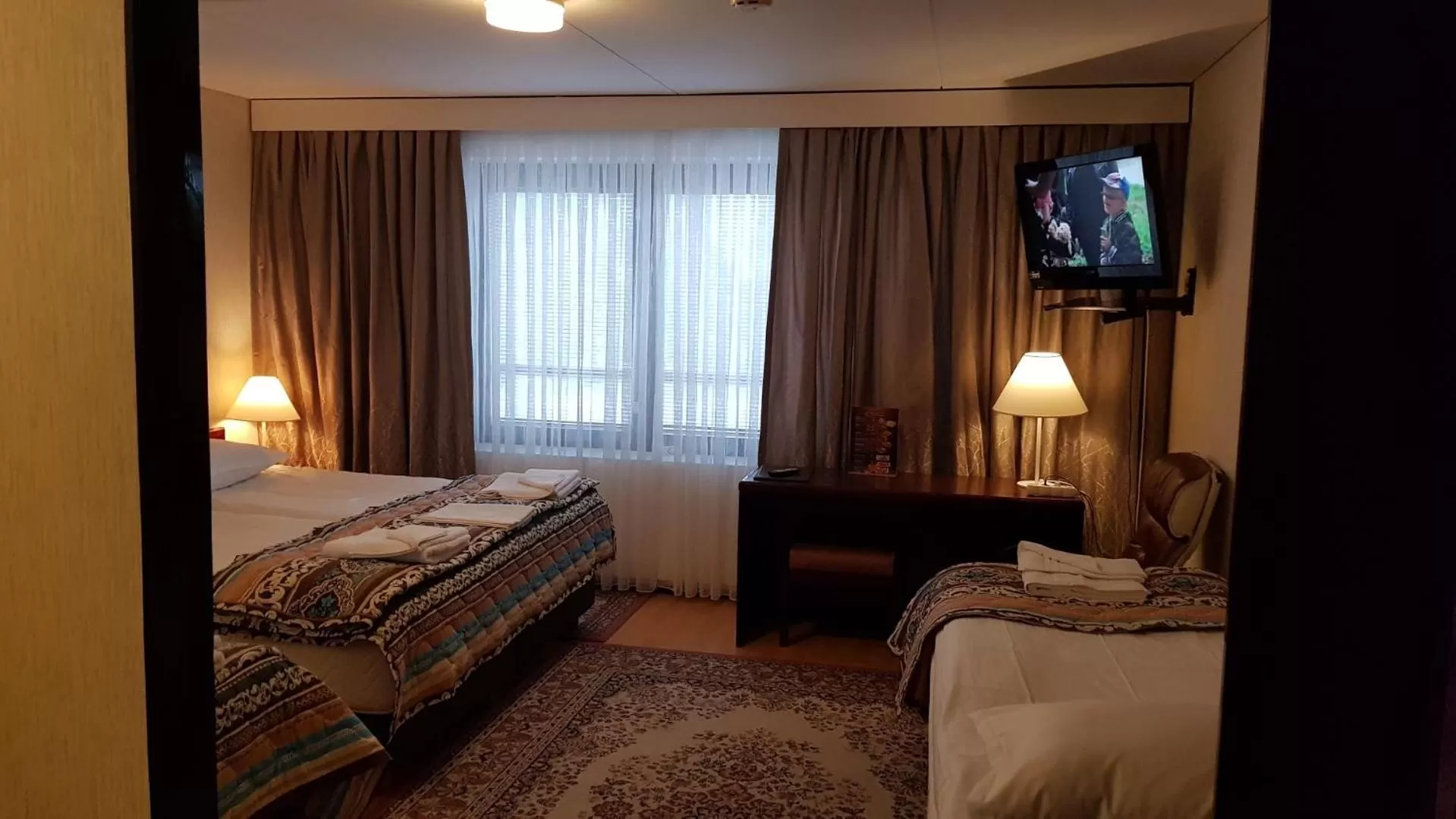 Bed in Hotelli Sandels