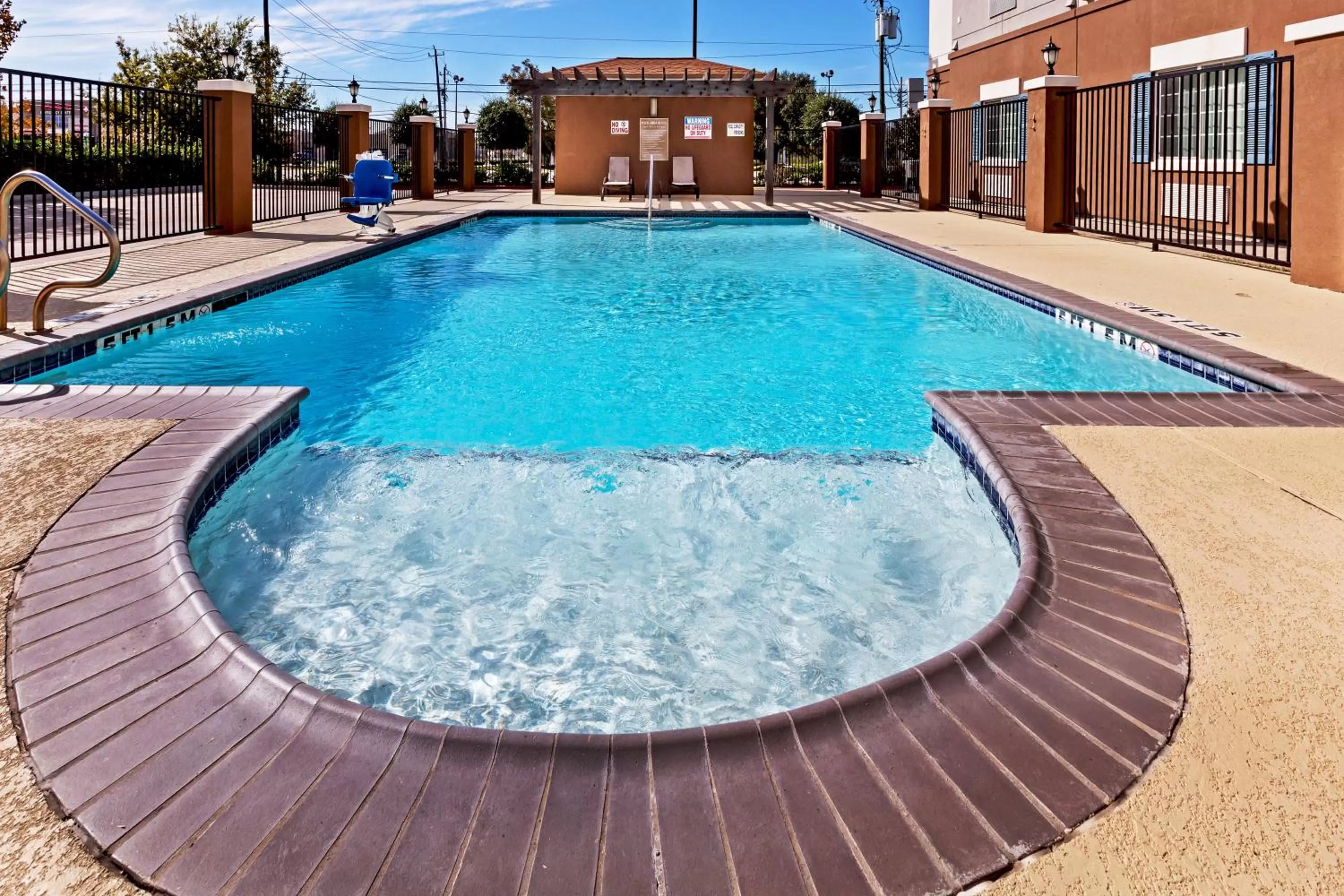 Swimming pool in Candlewood Suites Baytown by IHG