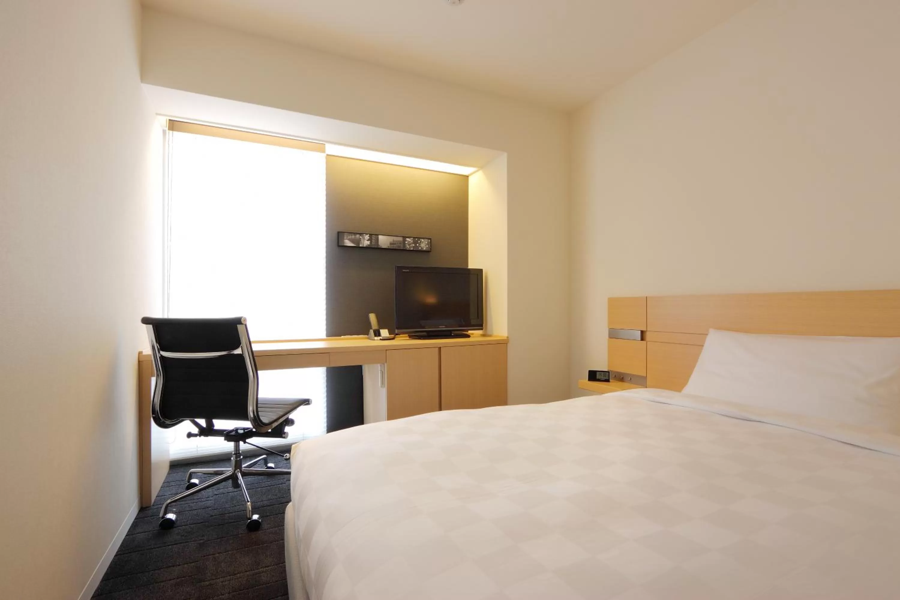 Bed in Hakata Tokyu REI Hotel