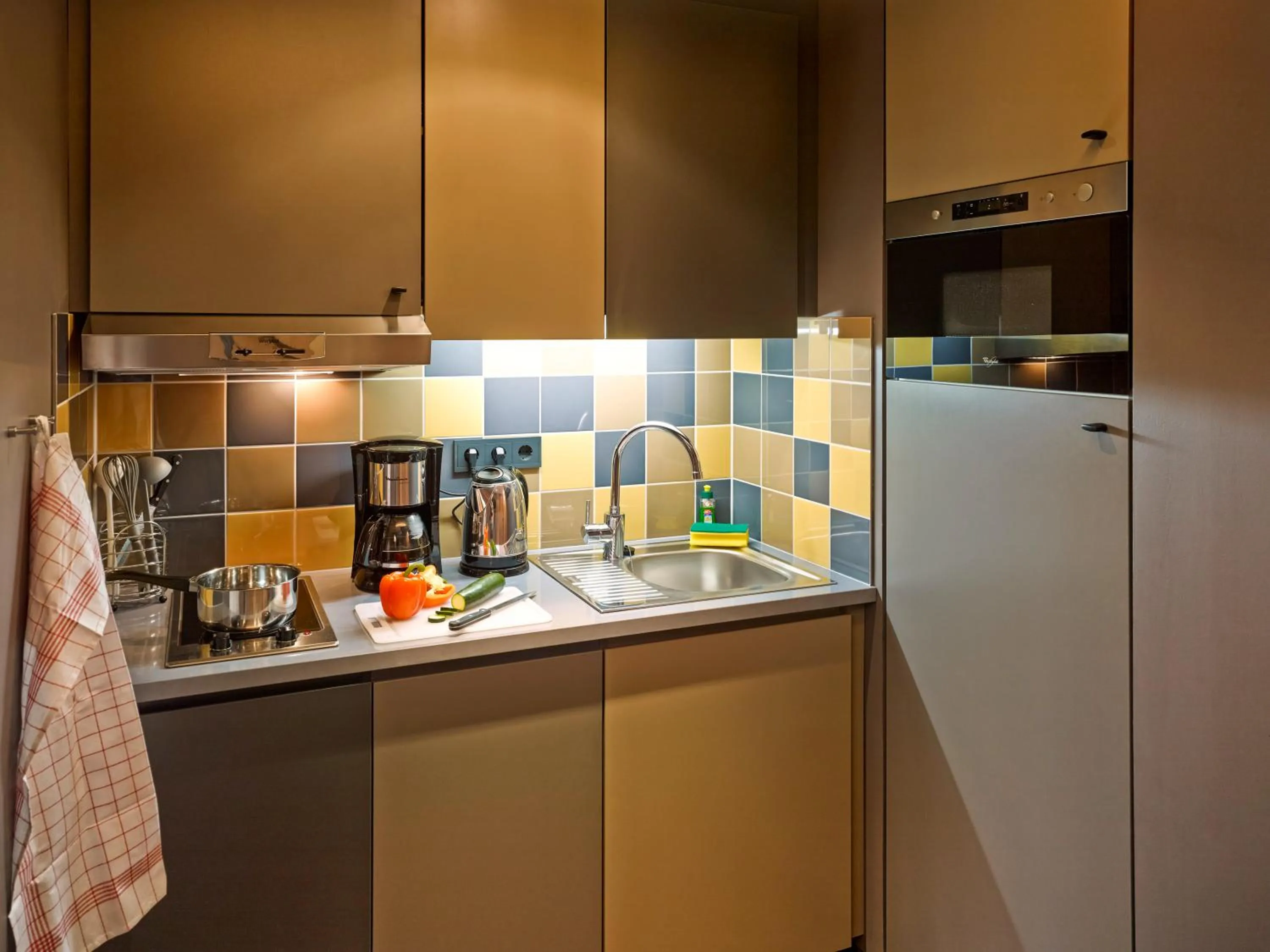 Kitchen or kitchenette in Aparthotel Adagio Köln City