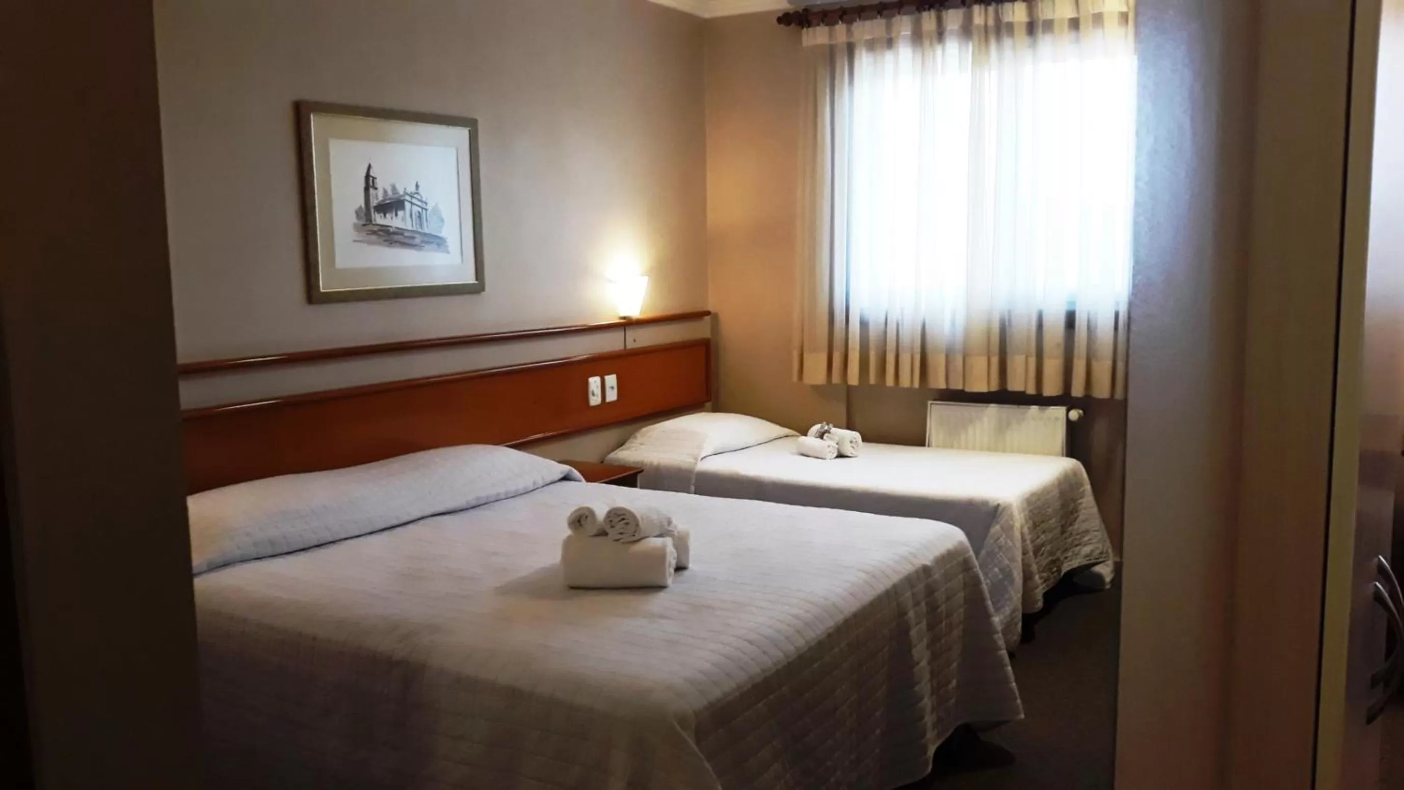 Bed in Farina Park Hotel