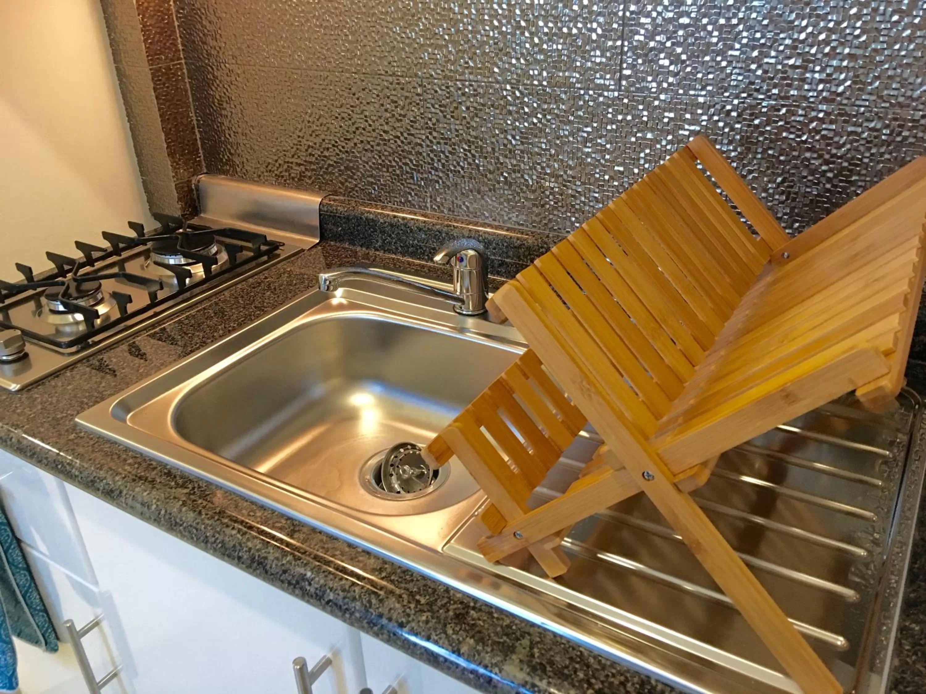 Kitchen or kitchenette in Herbal Inn Suites