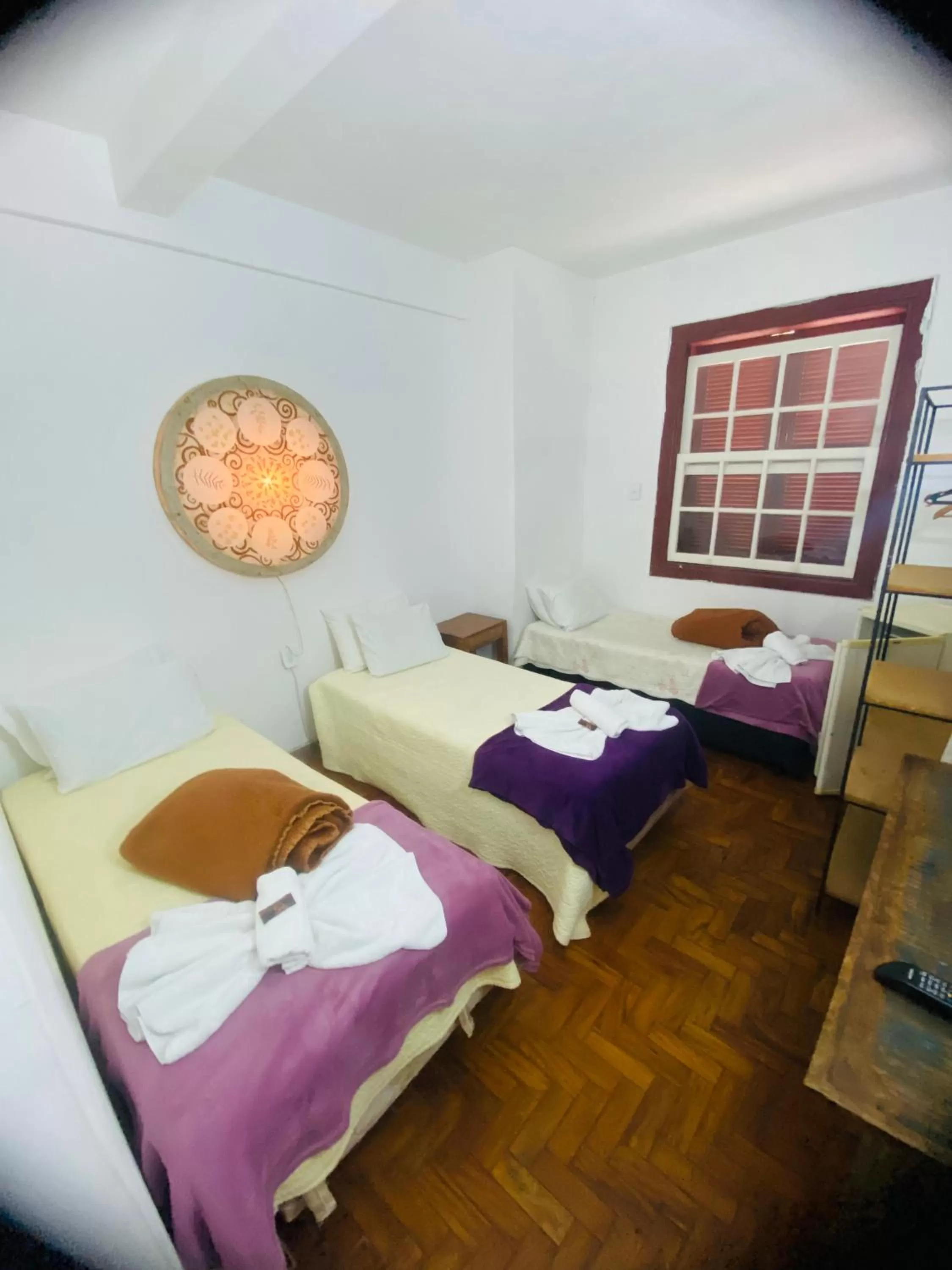 Bed in POUSADA CHARLOTTE