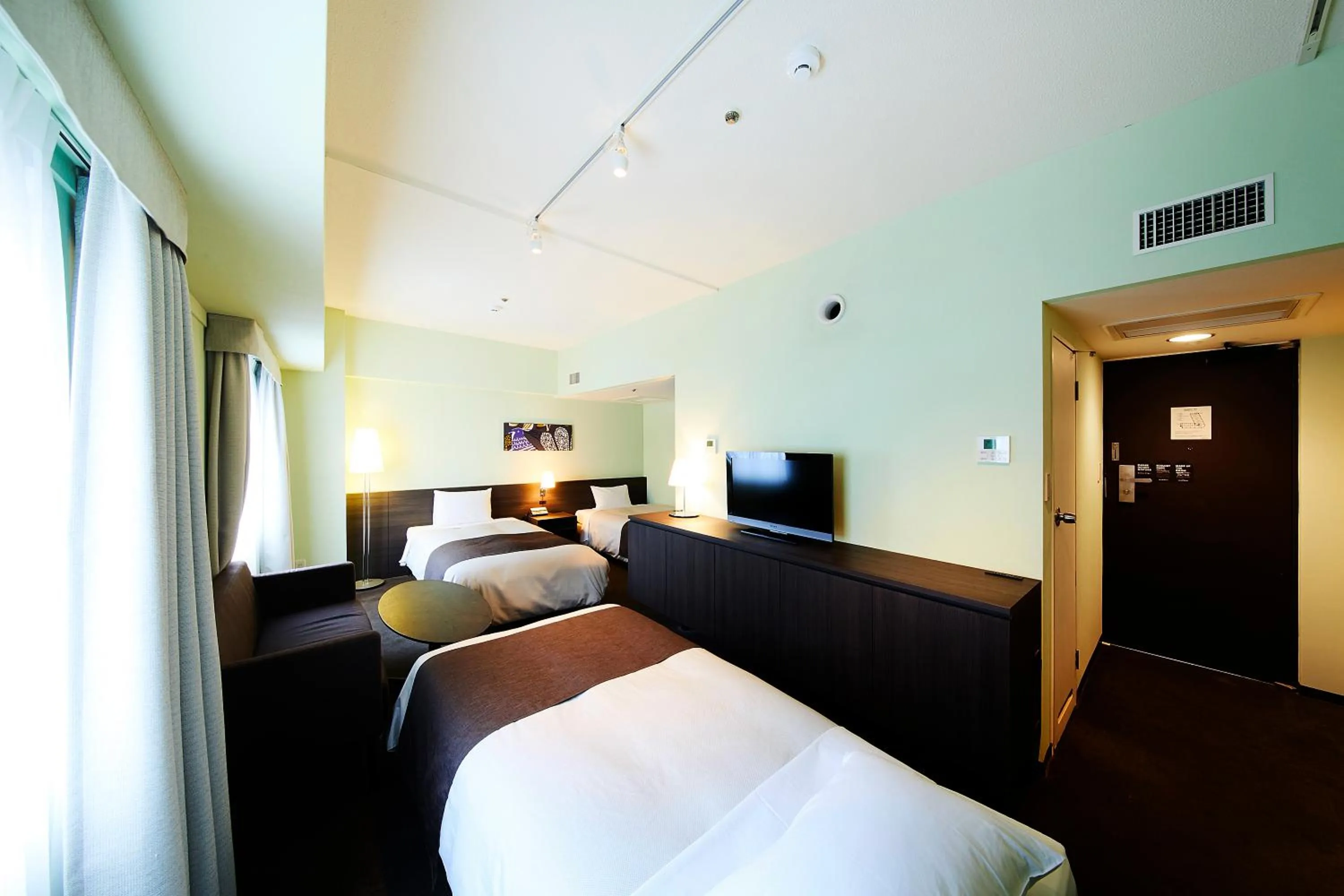 Bed in Ginza Grand Hotel