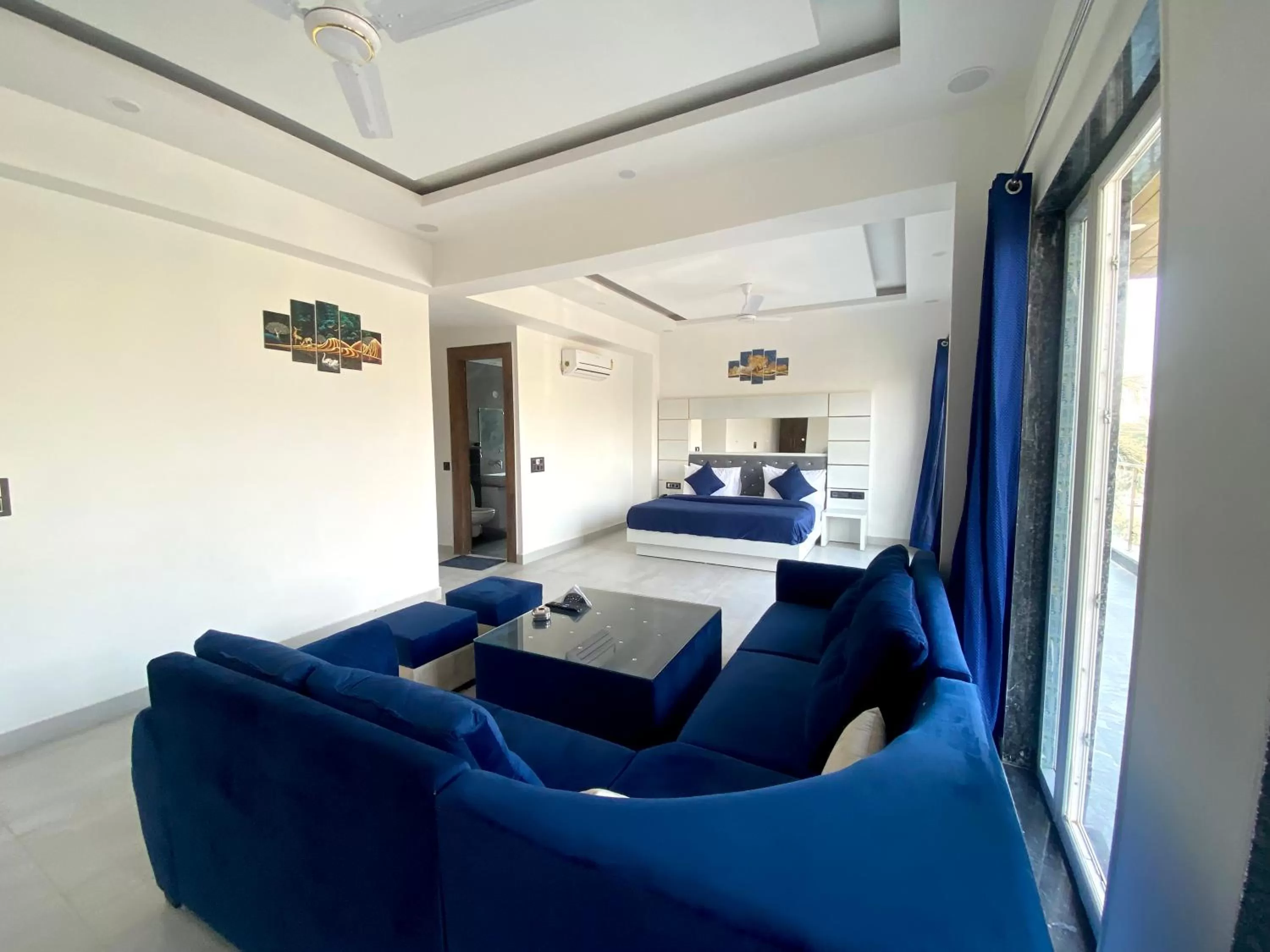 Bedroom, Seating Area in The Metro Stay By F9 Hotels-Near Sector 18 Metro Station Noida