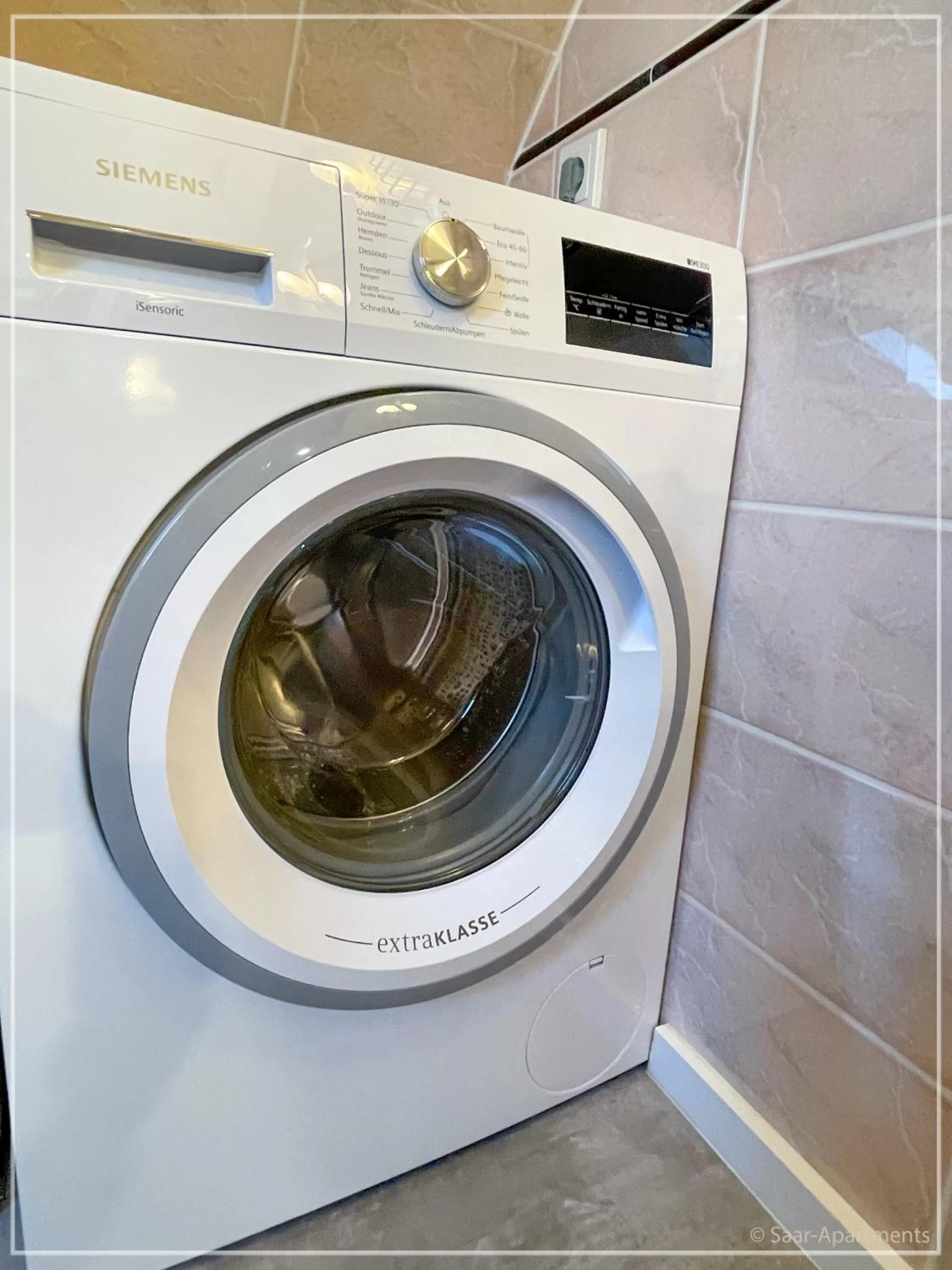 washing machine in Saar-Apartments