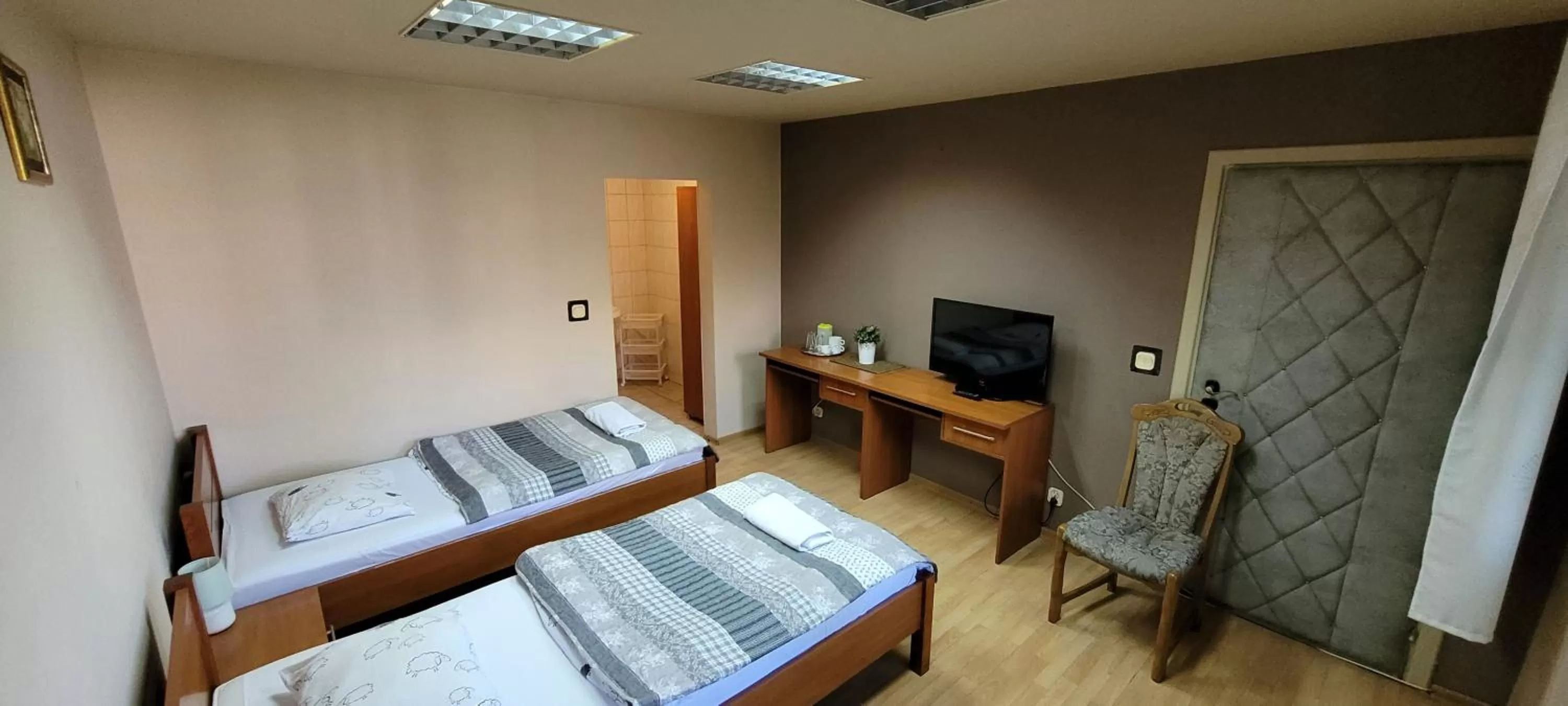 Bed in Dworek Pokoje Gościnne