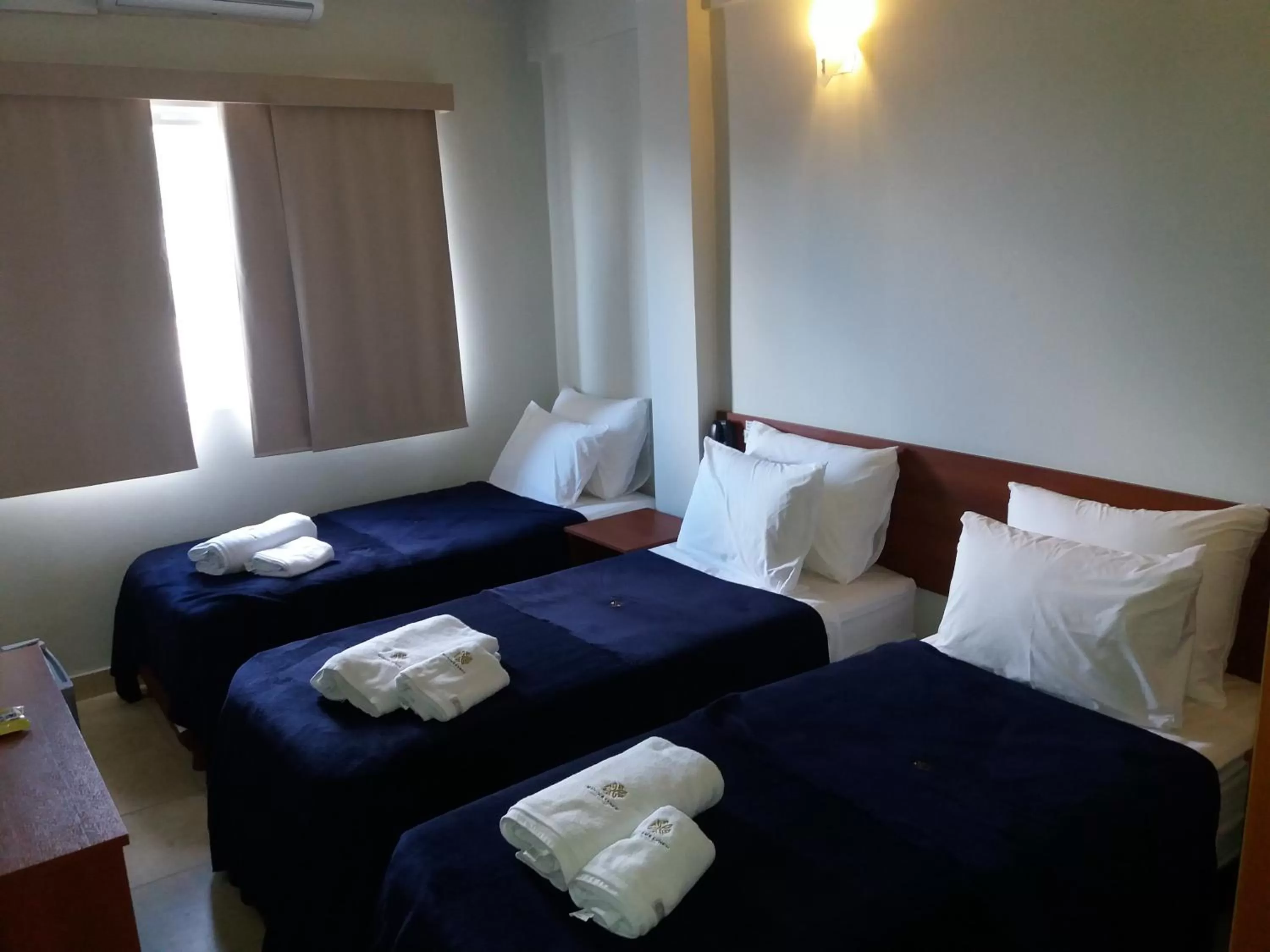 Bed in Madame Lynch Hotel Asuncion