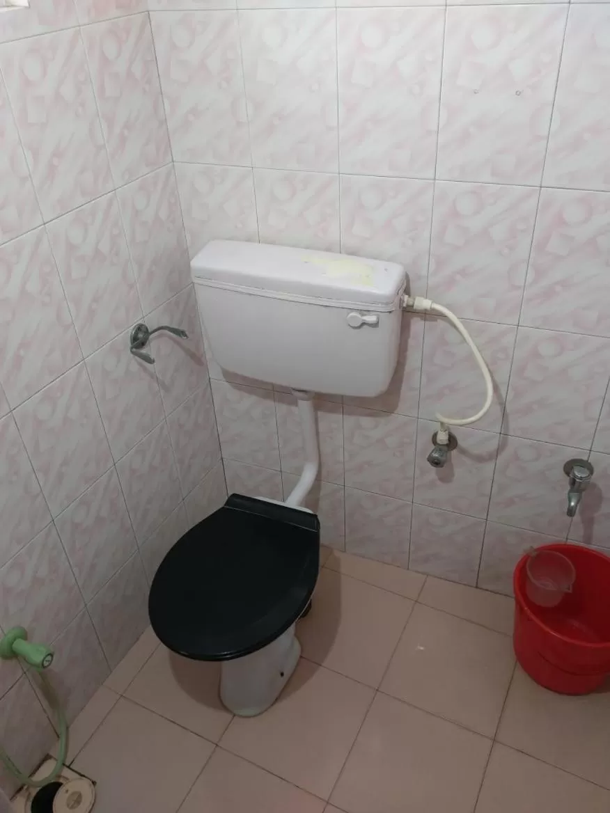 Bathroom in Anandan Tourist Home