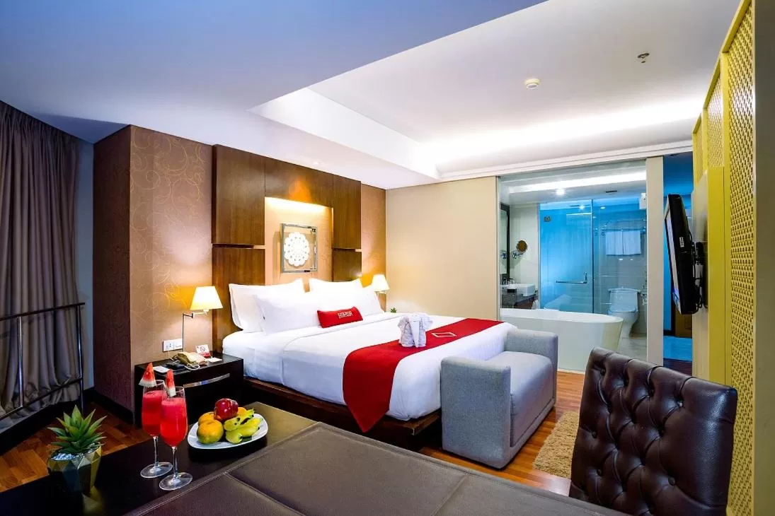Bed in Emersia Hotel and Resort
