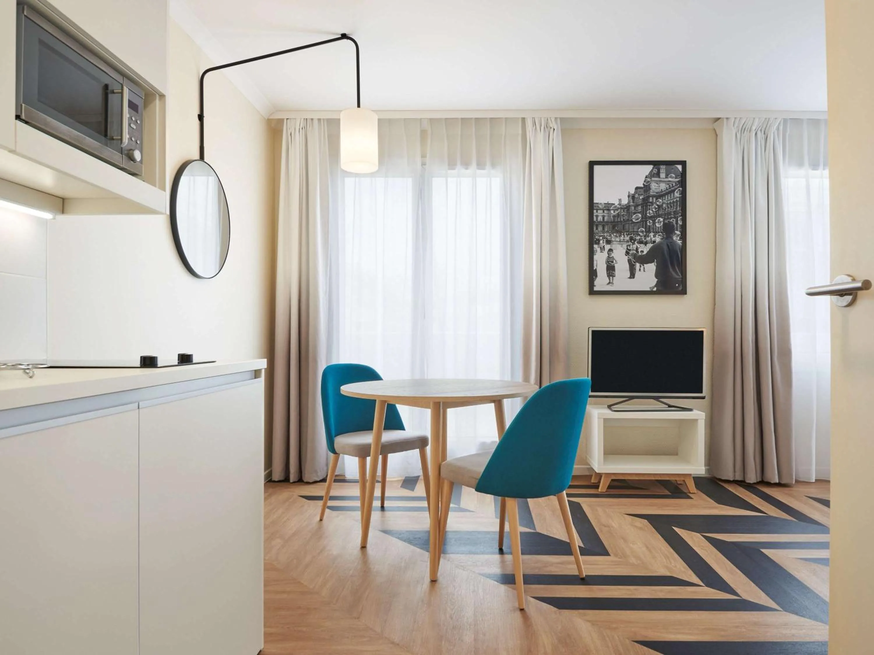 Photo of the whole room in Aparthotel Adagio Porte de Versailles