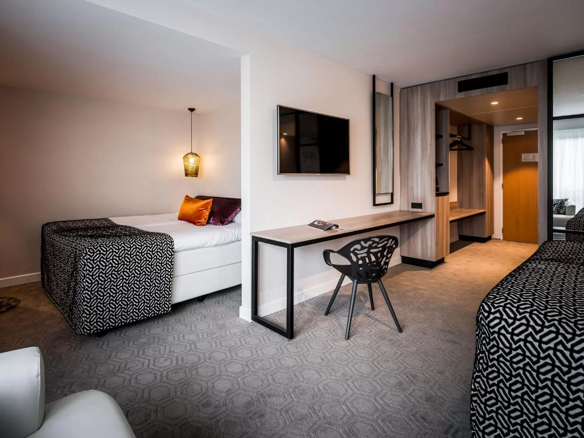 Seating area, Bed in Hotel Van der Valk Maastricht