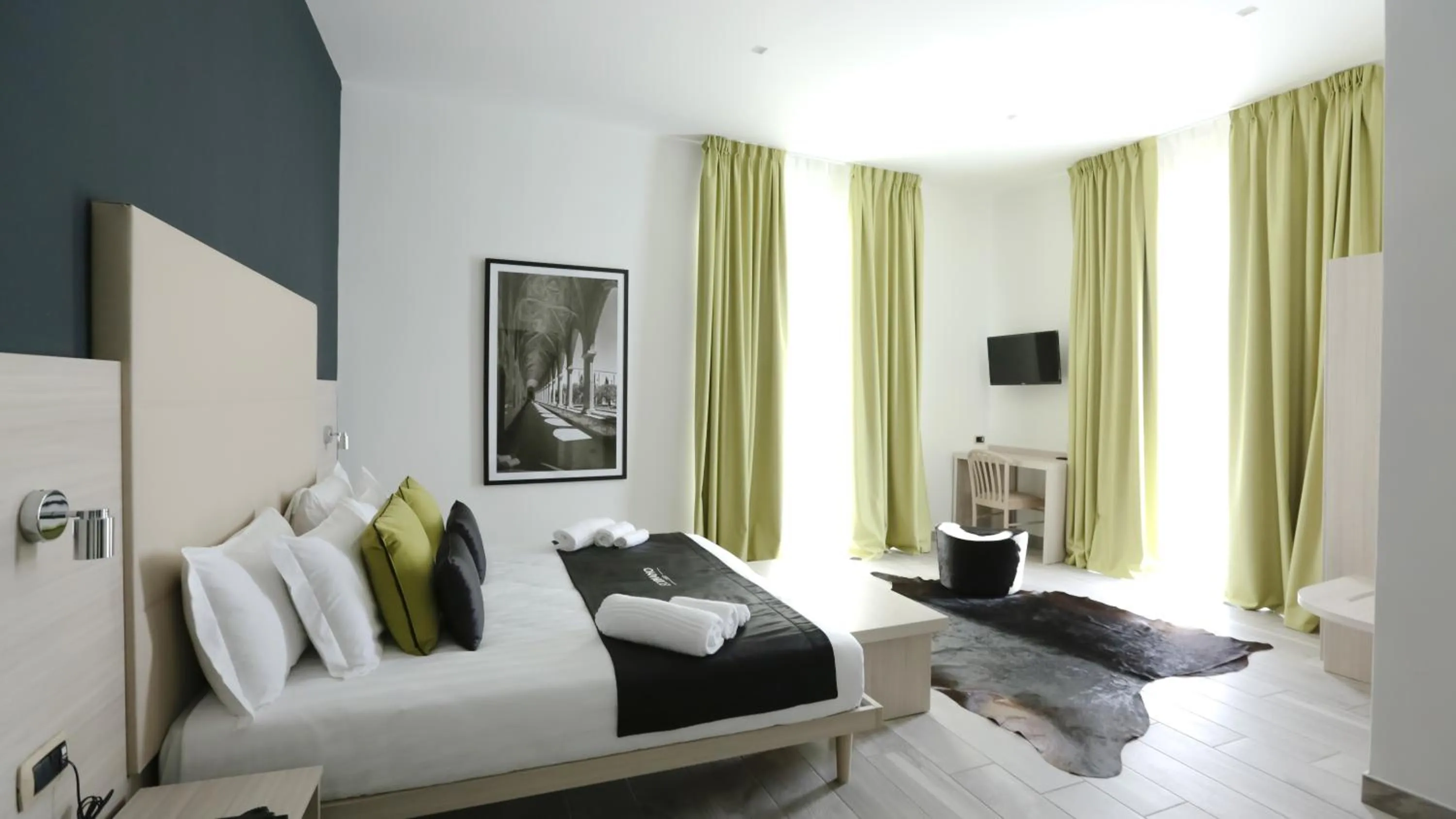 Photo of the whole room, Bed in Ecumano Space