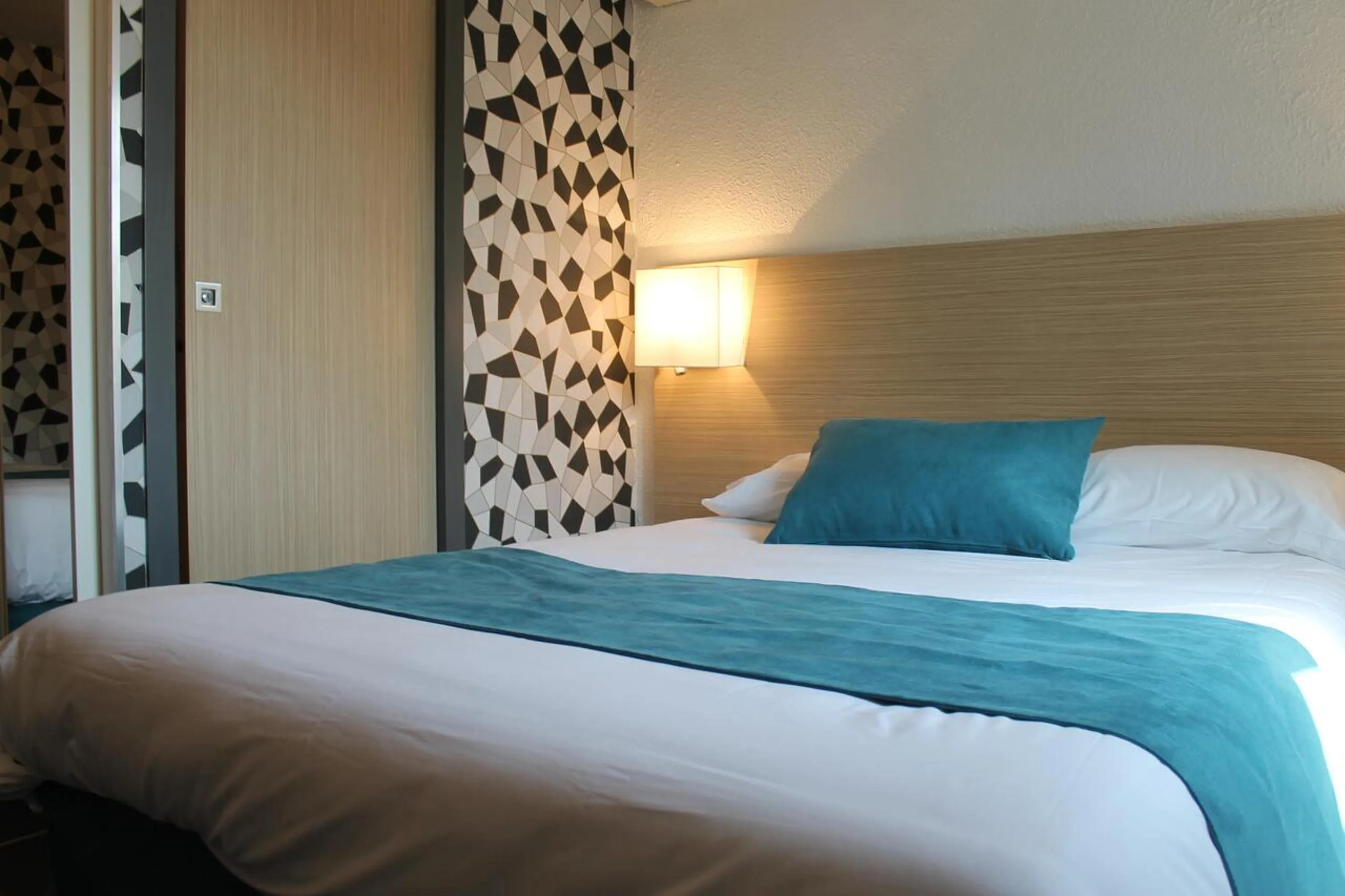 Bed in Hôtel Le Blason