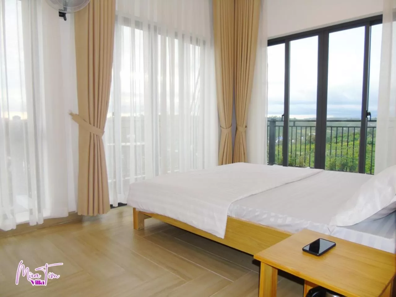 Photo of the whole room, Bed in Mùa Tím Villa