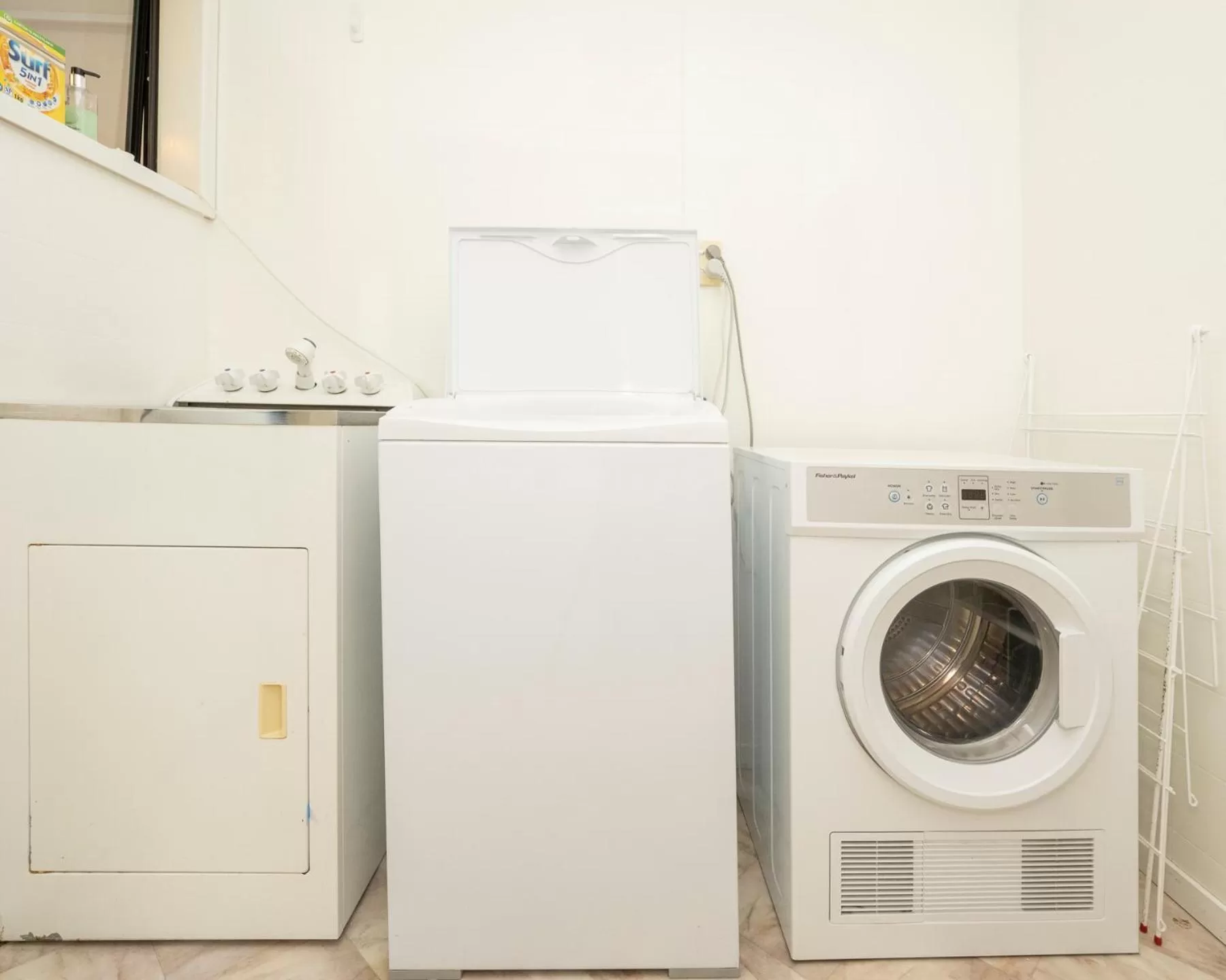 laundry in Tudor Park Motel Spacious with kitchens 1 minute walk to restaurant and shopping centre and Gisborne Hospital