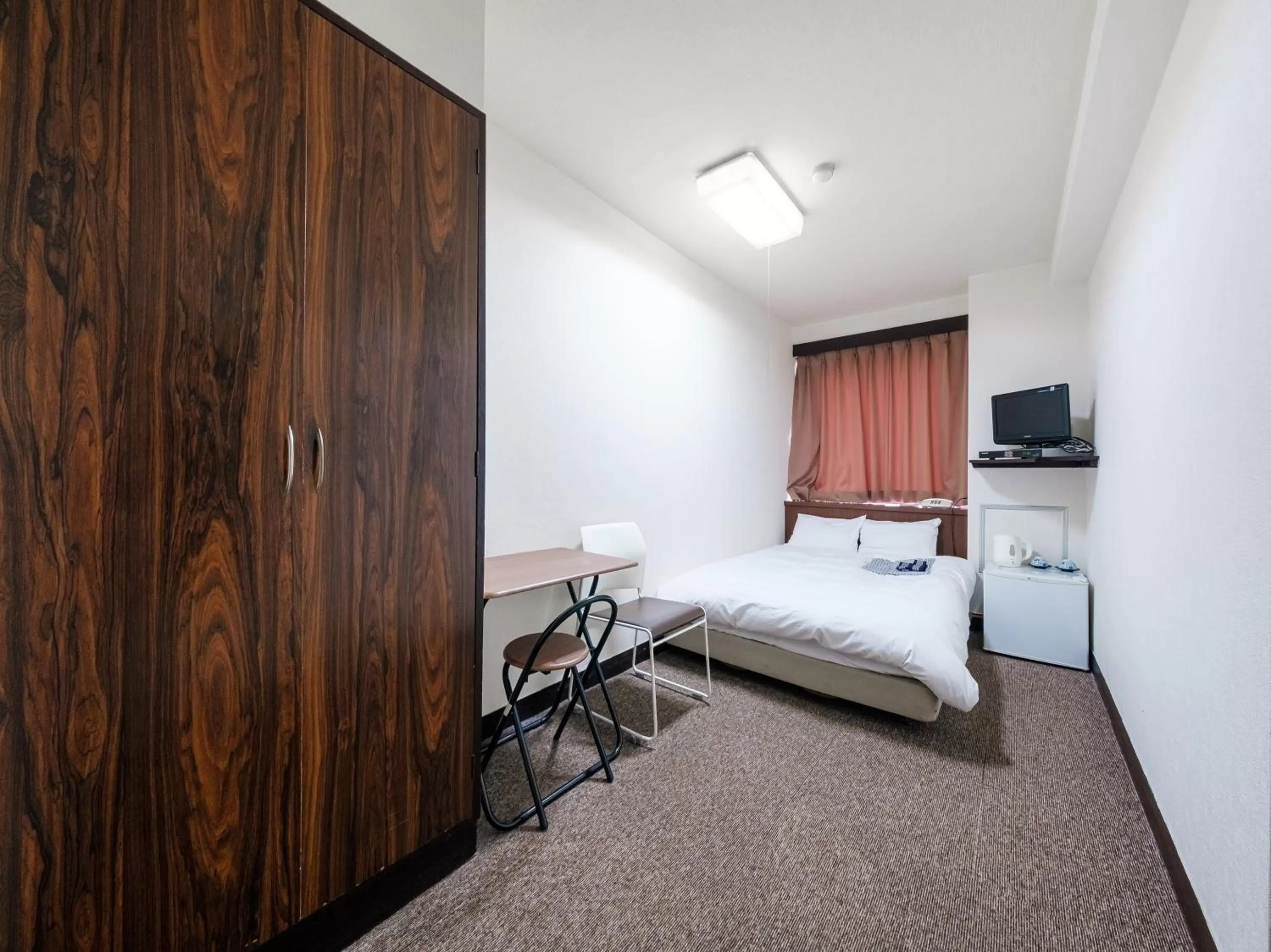 Bed in Tabist Hotel Tetora Hakodate Station