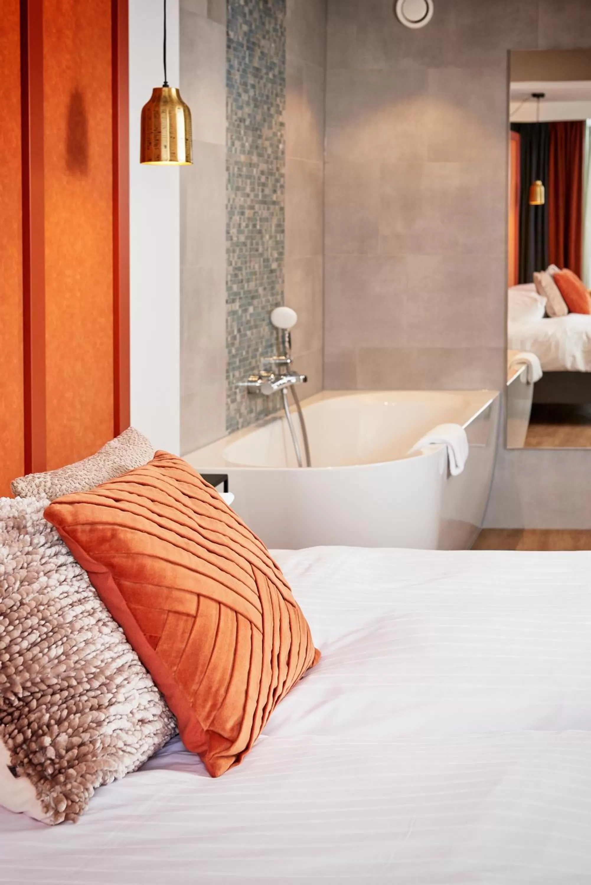 Bed in De Maasparel Nextdoor Maassuites